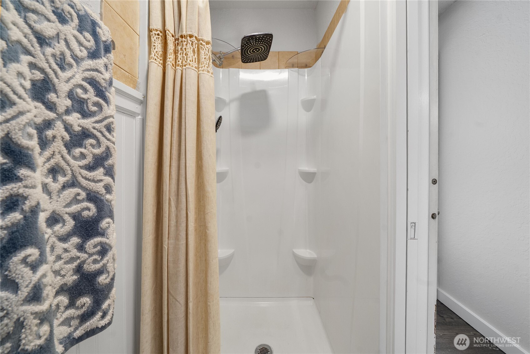 14401 Southeast Petrovitsky Road, Unit G204 Renton, WA 98058 - Photo 18 of 29 a bathroom with a glass shower door