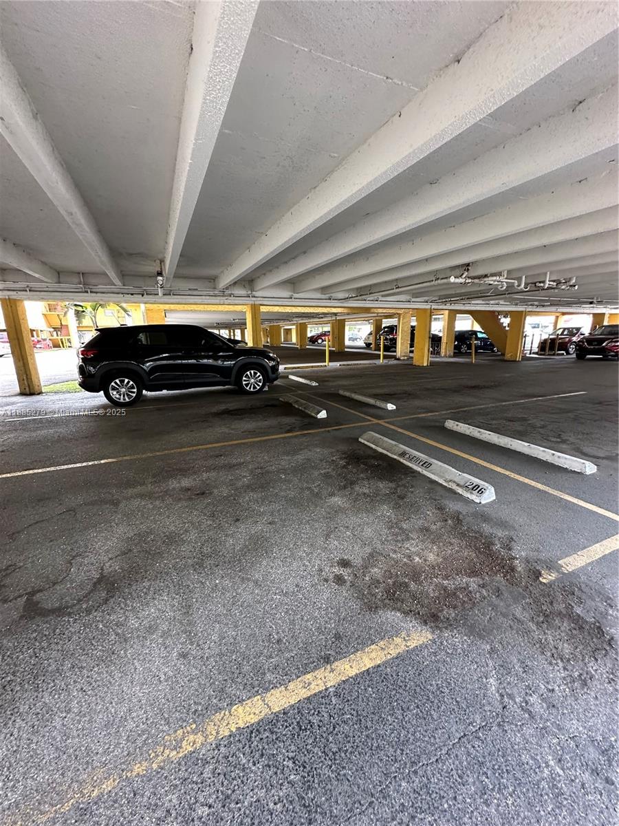 1555 West 44th Place, Unit 234 Hialeah, FL 33012 - Photo 34 of 36 a view of car parking