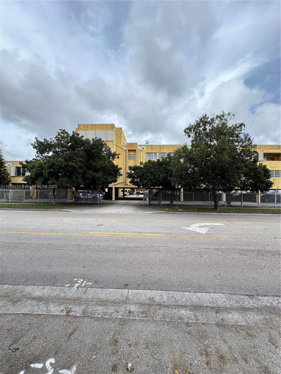 1555 West 44th Place, Unit 234 Hialeah, FL 33012 - Photo 36 of 36 a view of street with trees