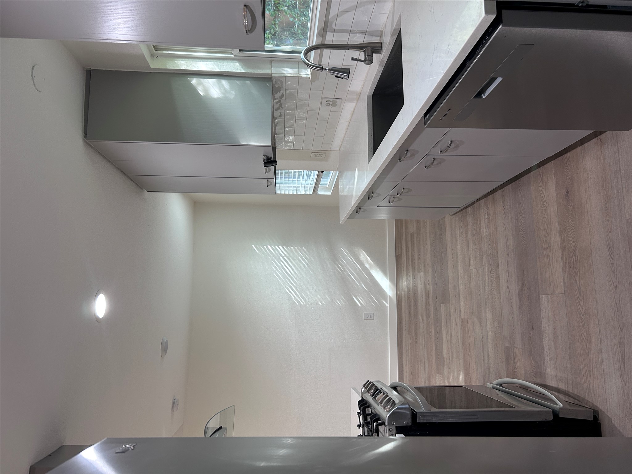 6603 Ripple Run Austin, TX 78744 - Photo 7 of 16 Prepare culinary creations in this well-appointed kitchen, featuring sleek cabinetry and robust appliances.