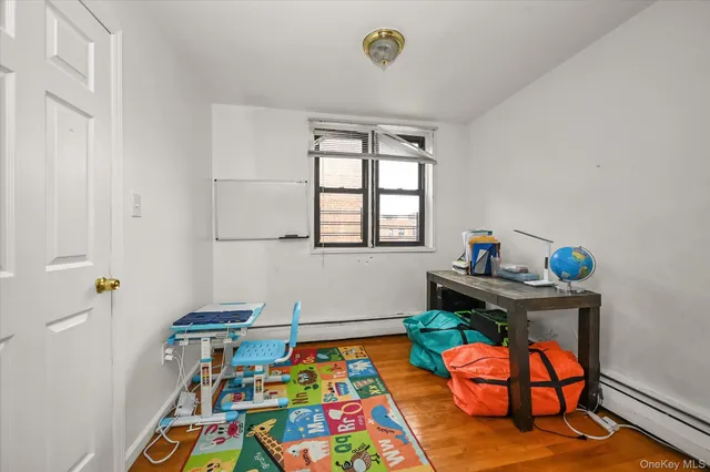 a room with furniture and wooden floor