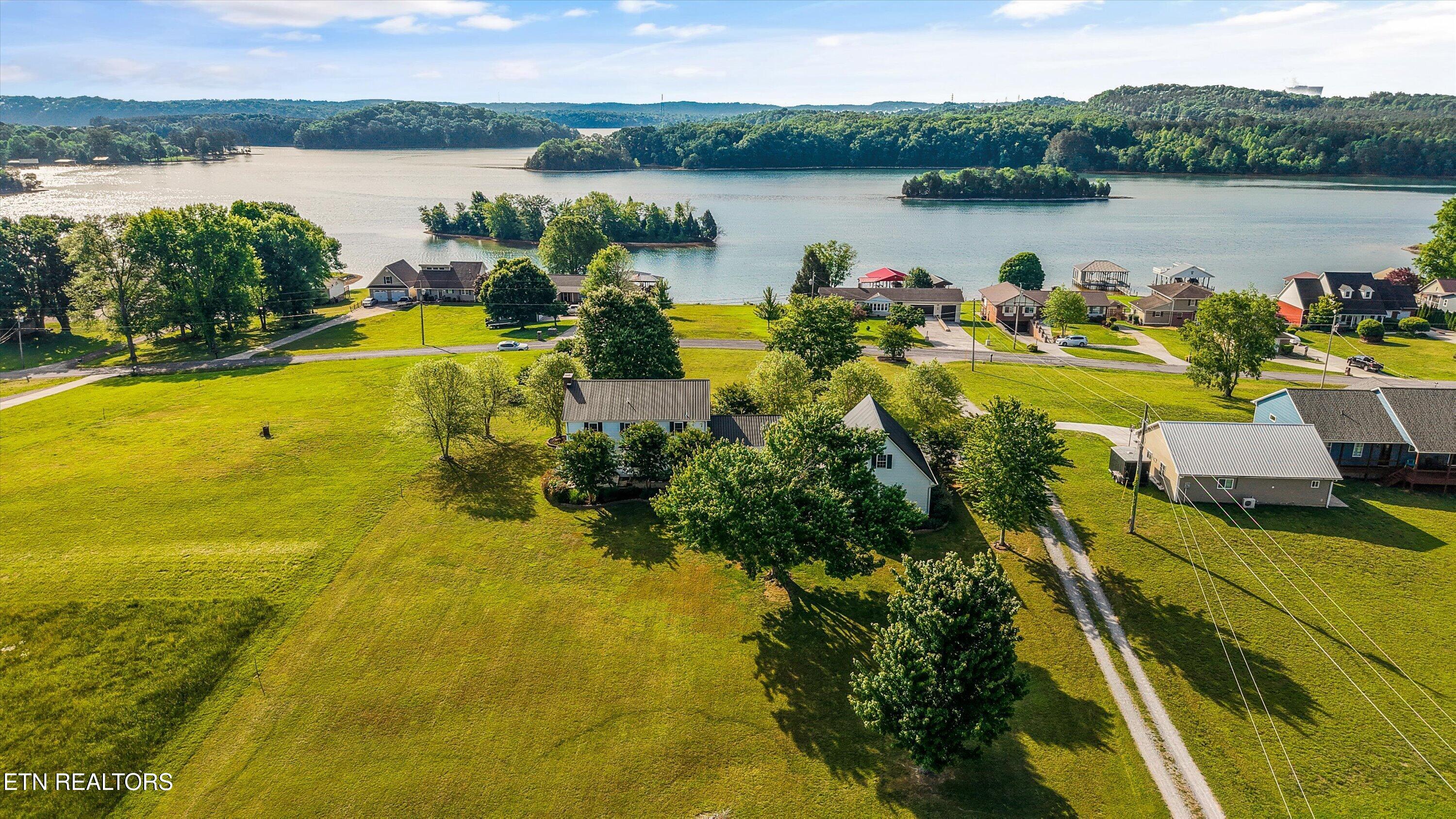 1167 Sable Road Spring City, TN 37381 - Photo 4 of 48 Drone View + Lake