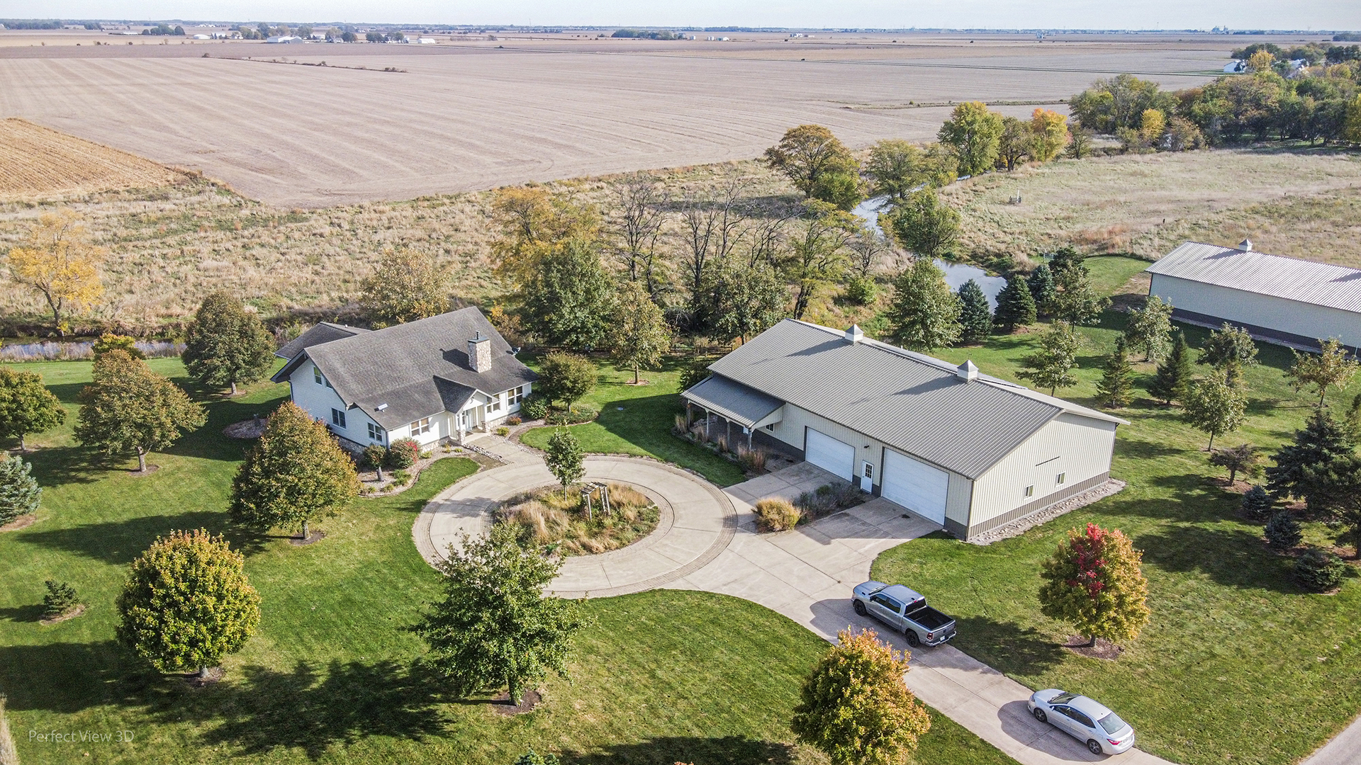 an aerial view of a house with a garden