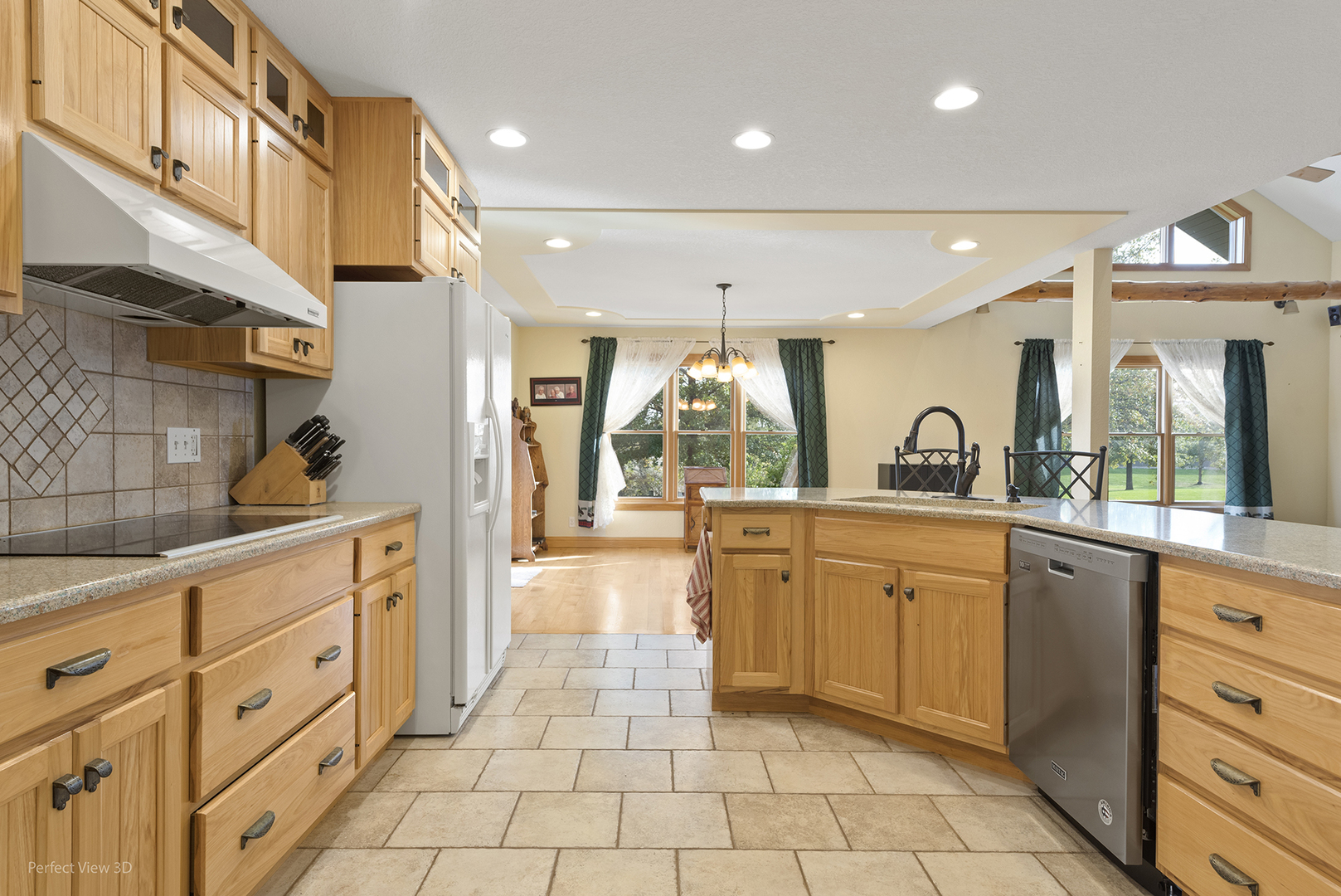 6670 South Old Mazon Road Gardner, IL 60424 - Photo 13 of 36 a large kitchen with stainless steel appliances lots of counter space and a sink