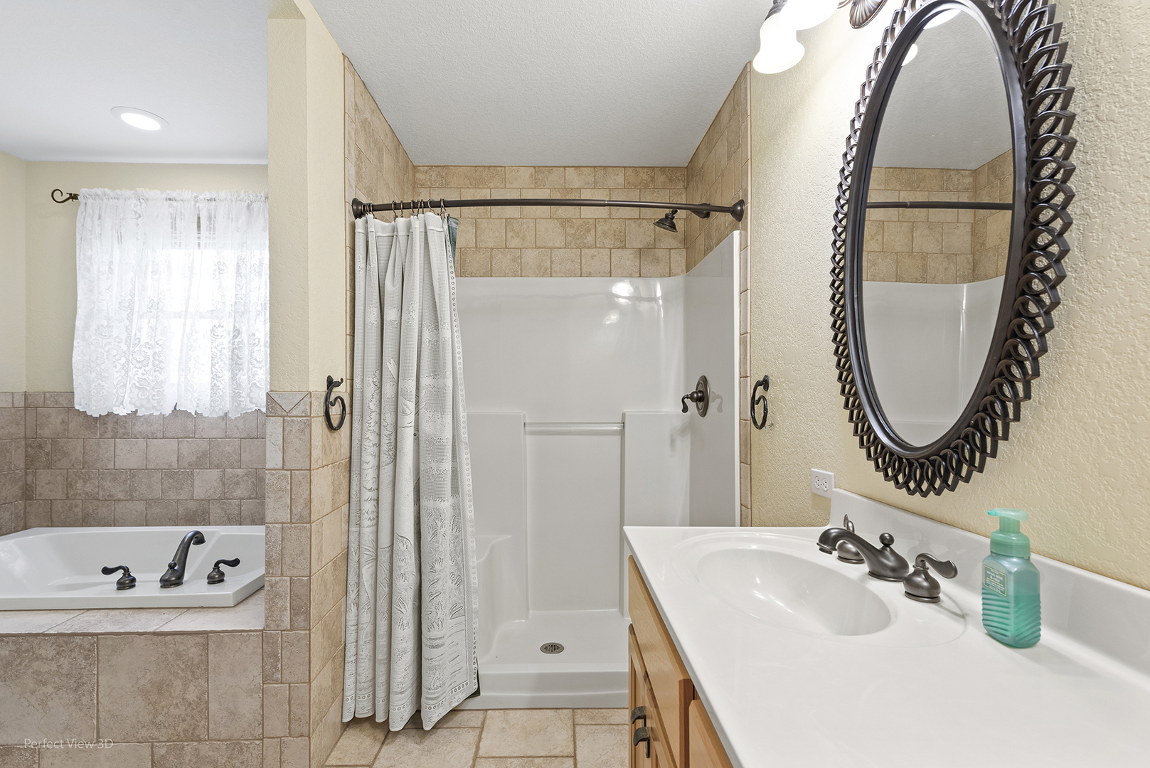 6670 South Old Mazon Road Gardner, IL 60424 - Photo 14 of 36 a bathroom with a sink a shower and a mirror