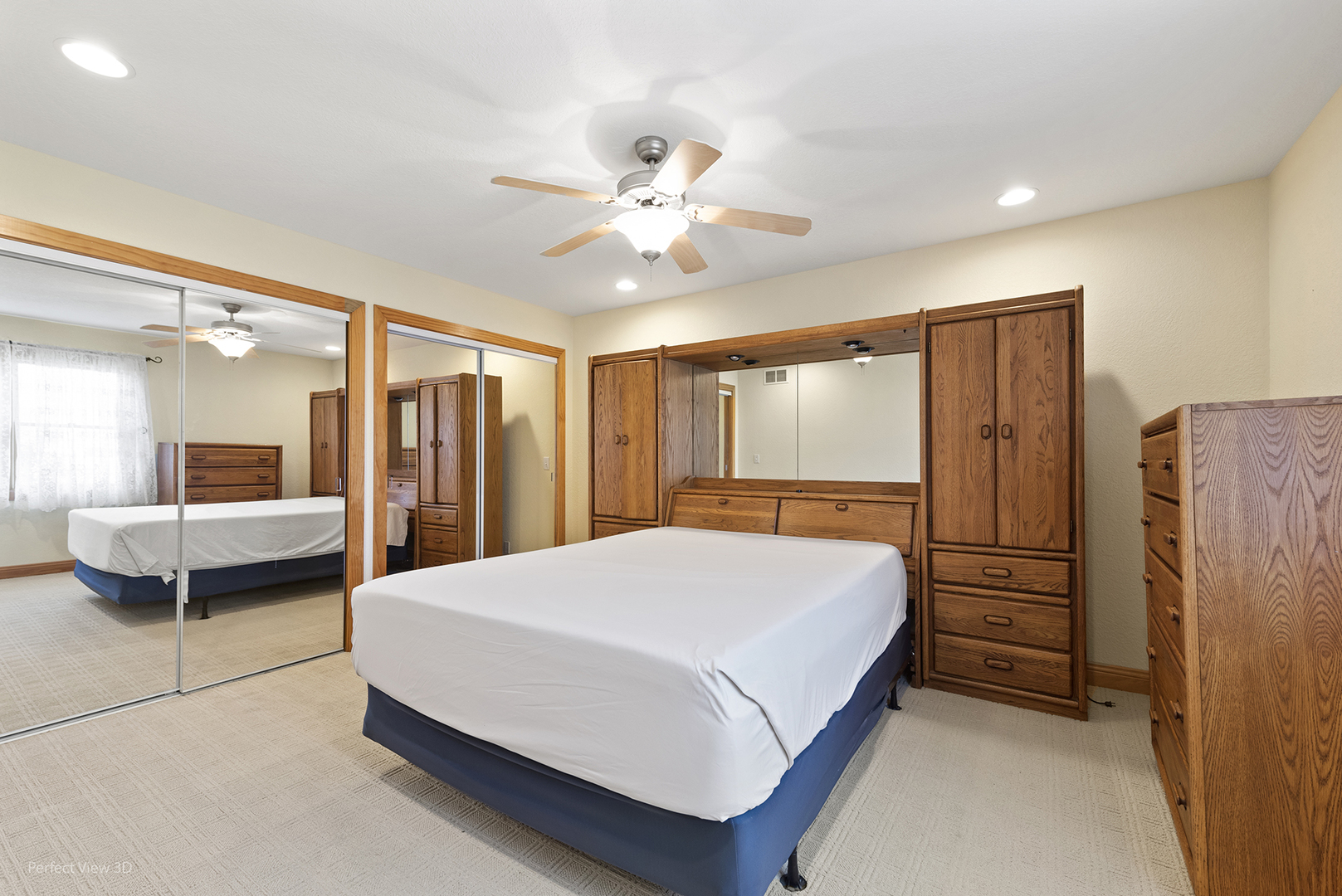 6670 South Old Mazon Road Gardner, IL 60424 - Photo 16 of 36 a spacious bedroom with a bed and a chandelier