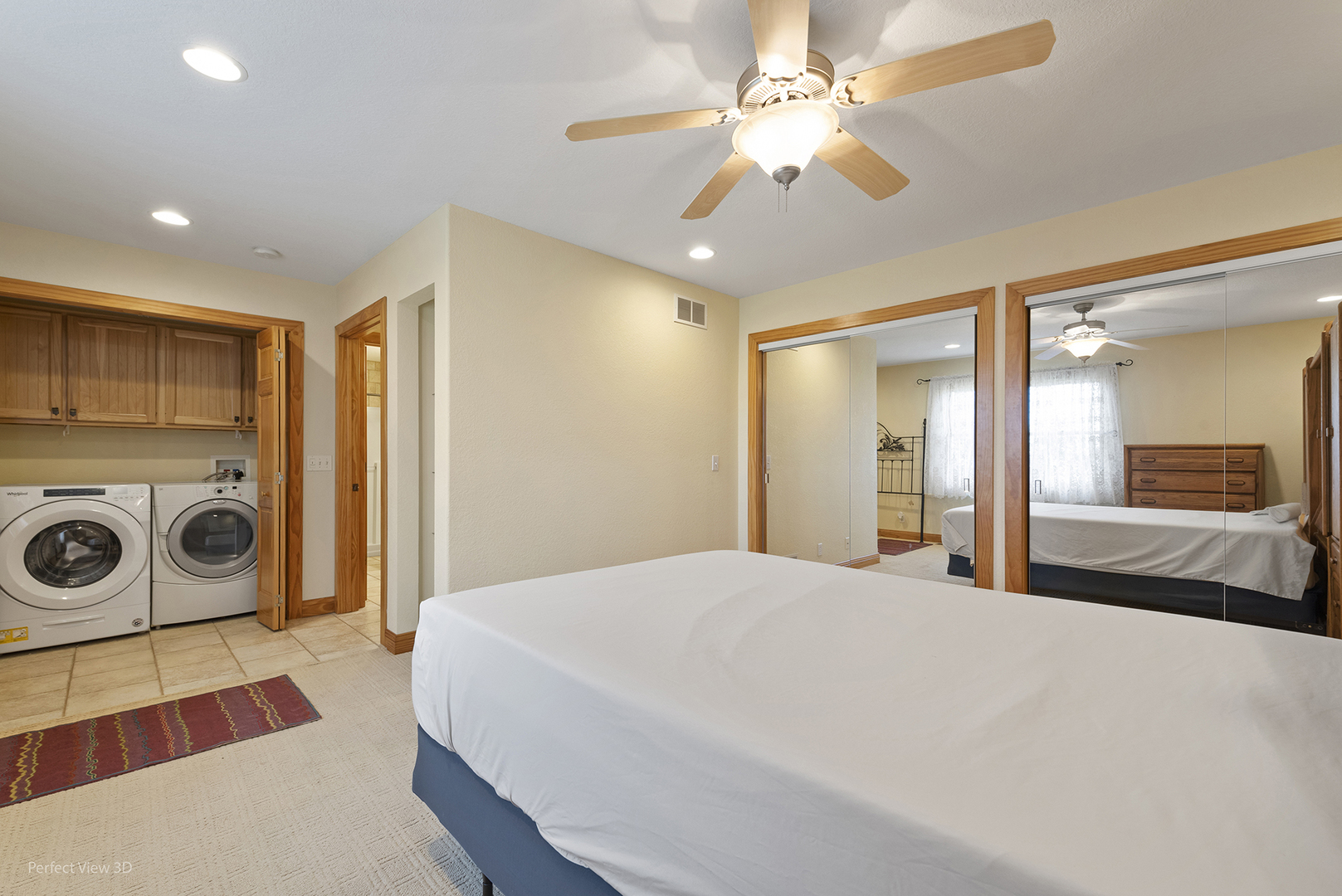 6670 South Old Mazon Road Gardner, IL 60424 - Photo 17 of 36 a bedroom with a bed and a chandelier