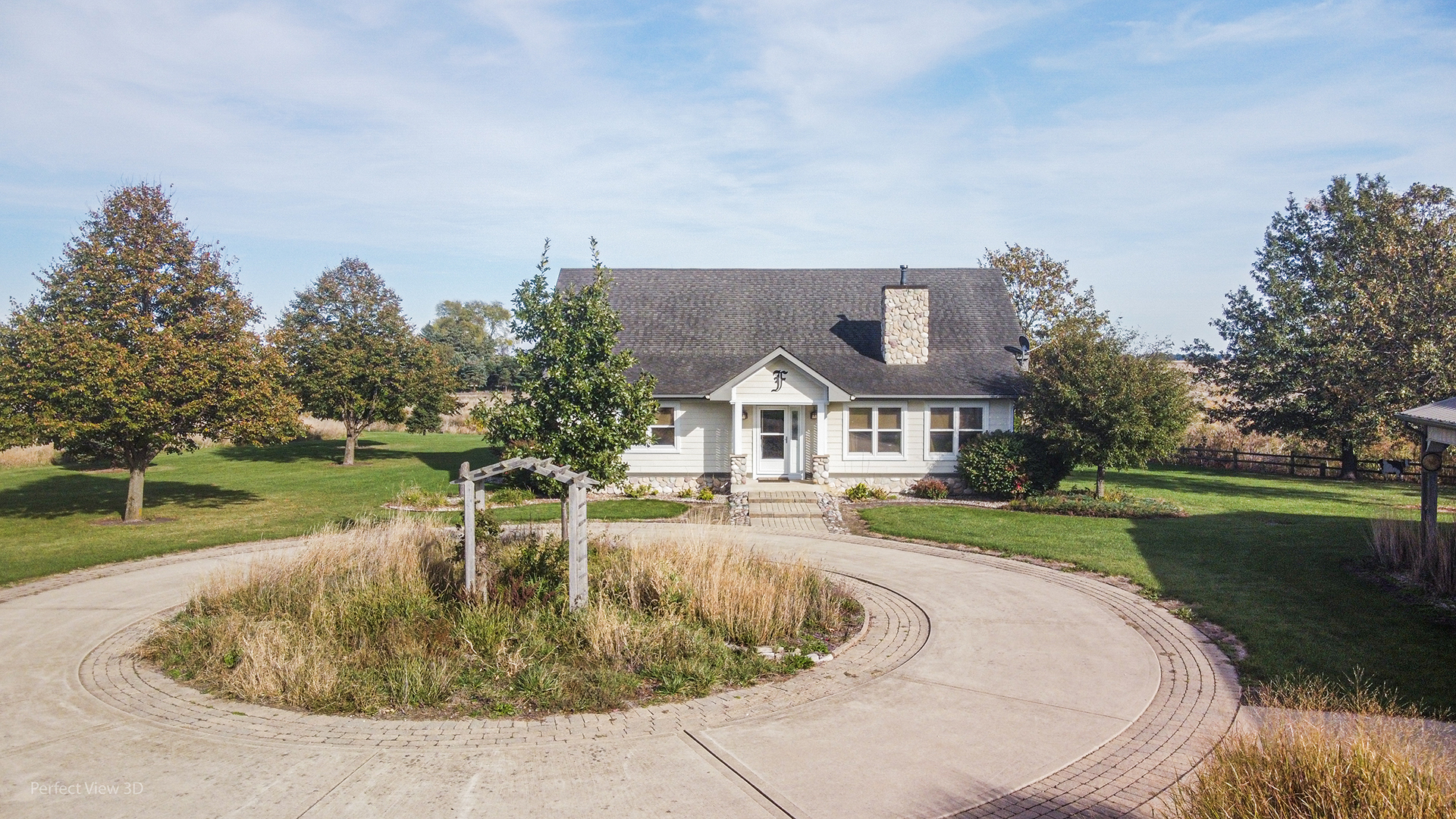 6670 South Old Mazon Road Gardner, IL 60424 - Photo 2 of 36 a view of a house with a yard table and chairs