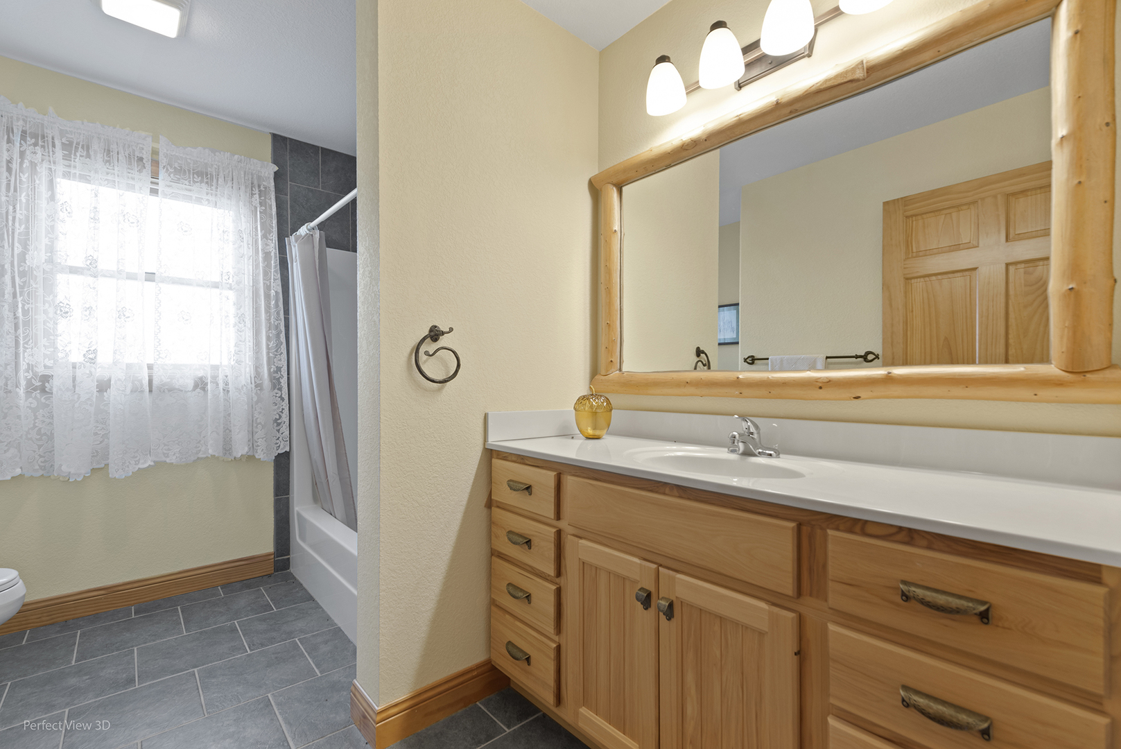 6670 South Old Mazon Road Gardner, IL 60424 - Photo 24 of 36 a bathroom with a sink and a mirror