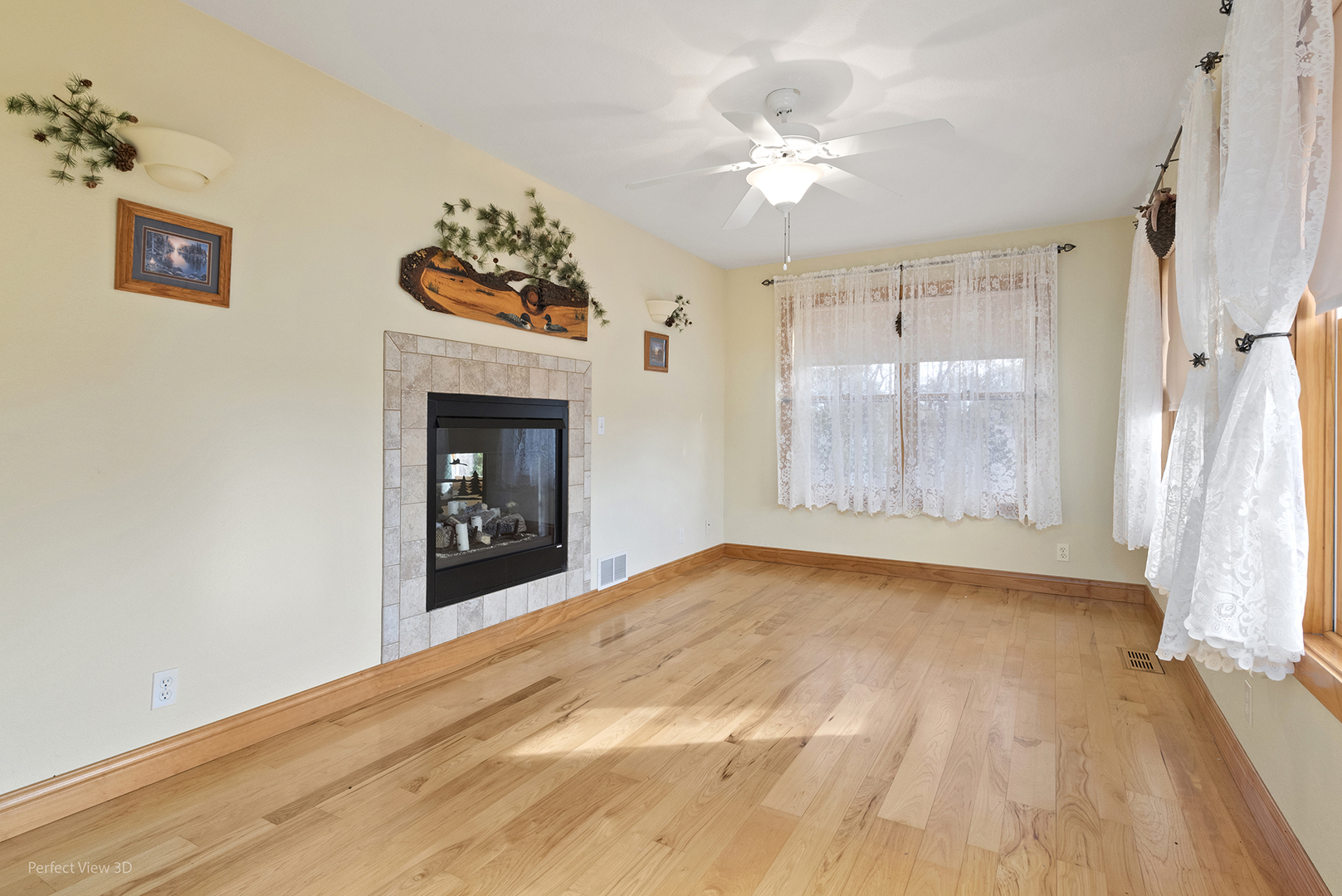 6670 South Old Mazon Road Gardner, IL 60424 - Photo 6 of 36 a view of an empty room with a fireplace