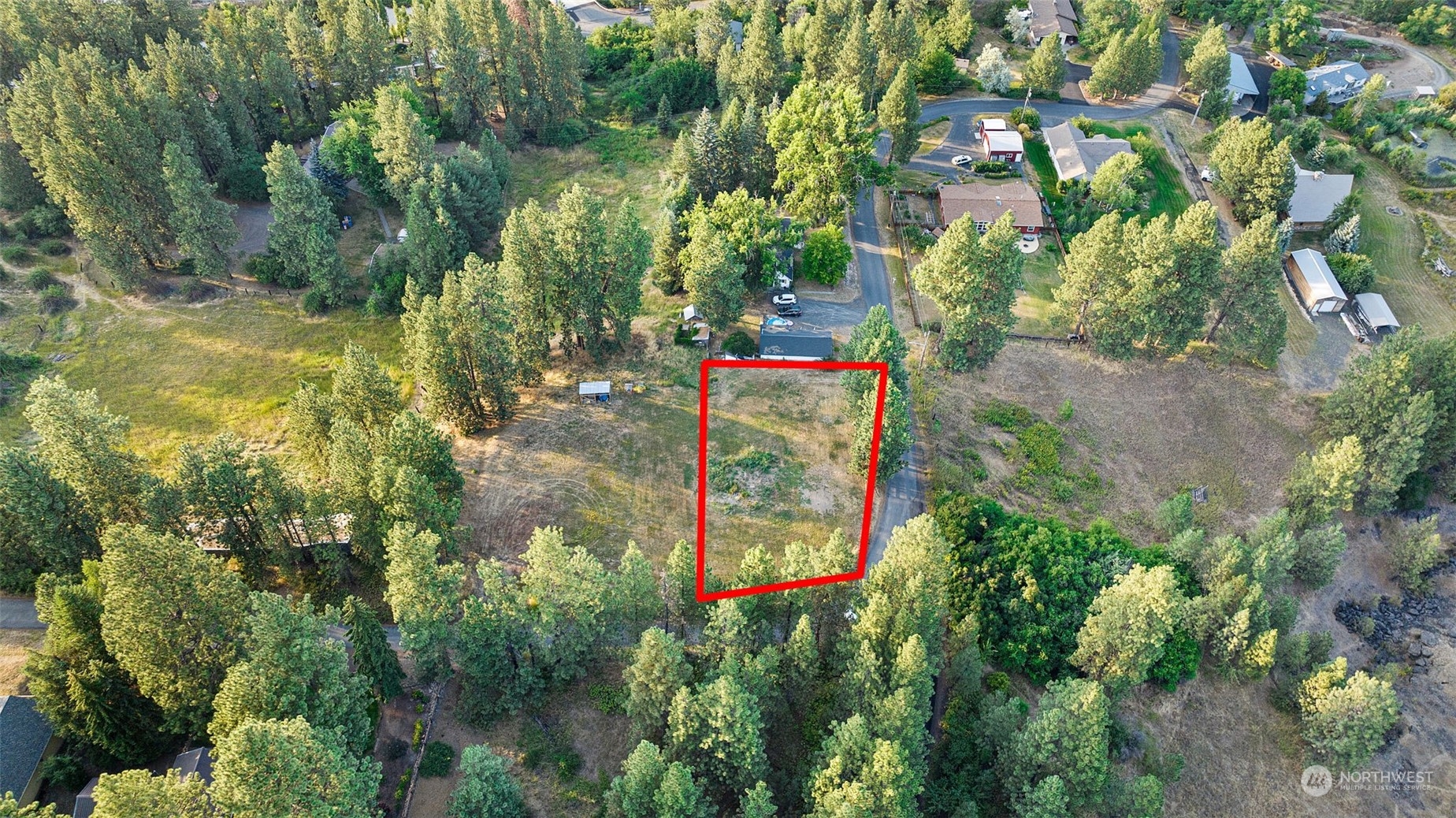 305 South River Road Palouse, WA 99161 - Photo 3 of 11 a sign that is sitting in the middle of a yard