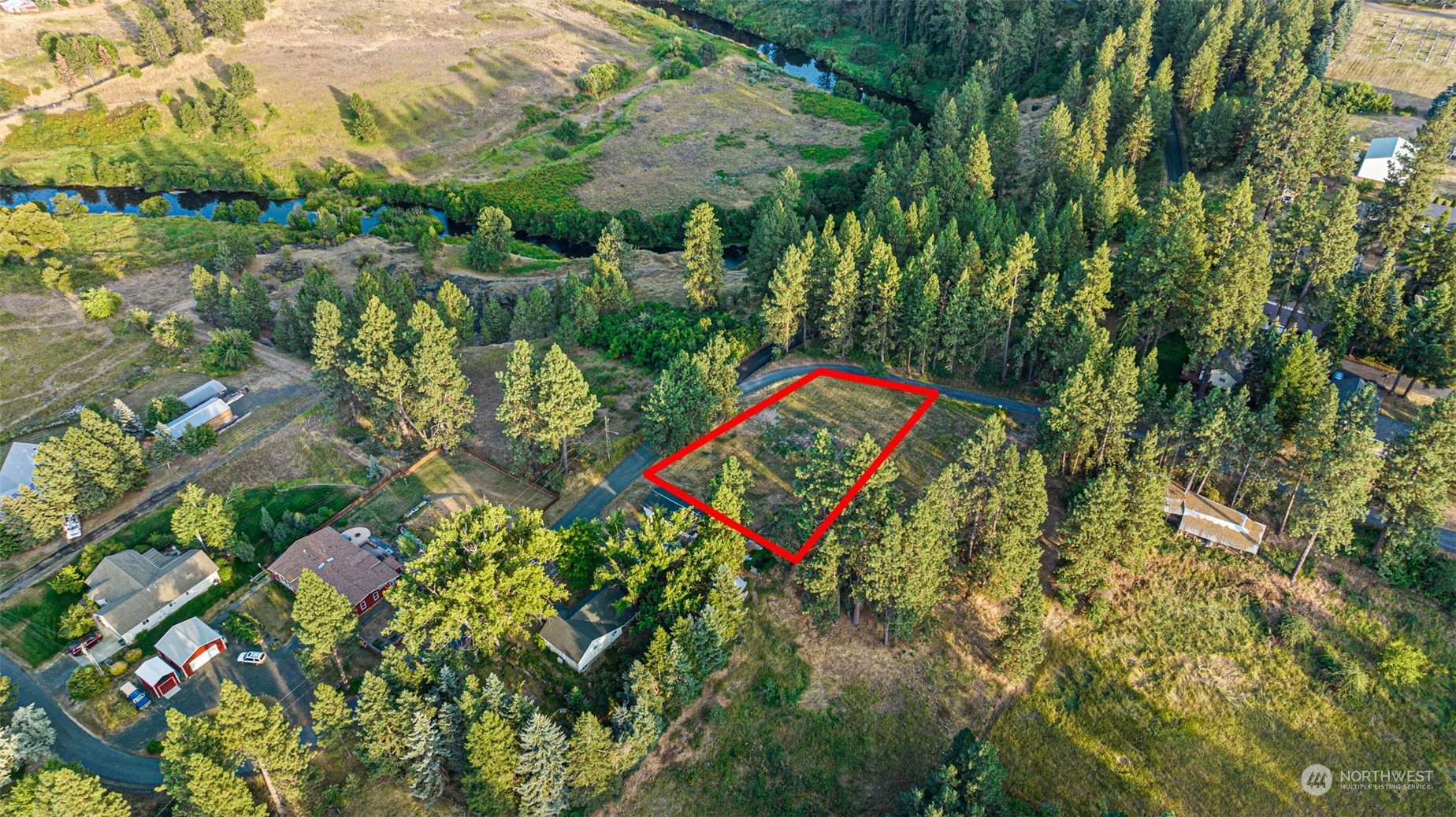 305 South River Road Palouse, WA 99161 - Photo 7 of 11 an aerial view of a residential houses with yard and swimming pool