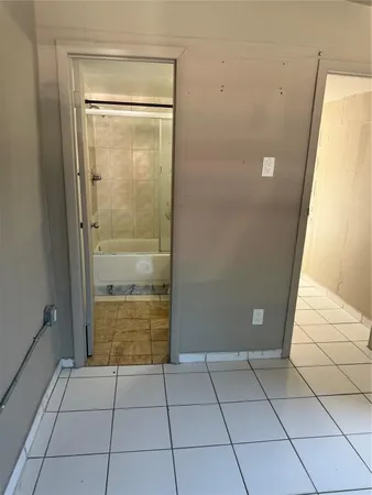 a view of an empty room and an empty room