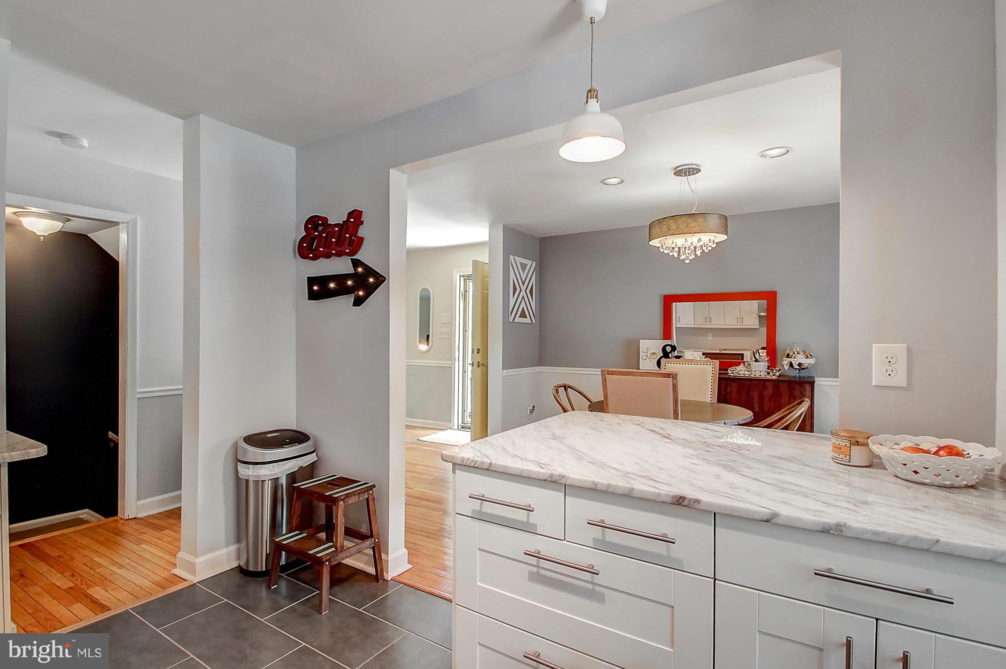 7222 Brookfalls Terrace Baltimore, MD 21209 - Photo 12 of 29 a bedroom with a bed and a flat screen tv