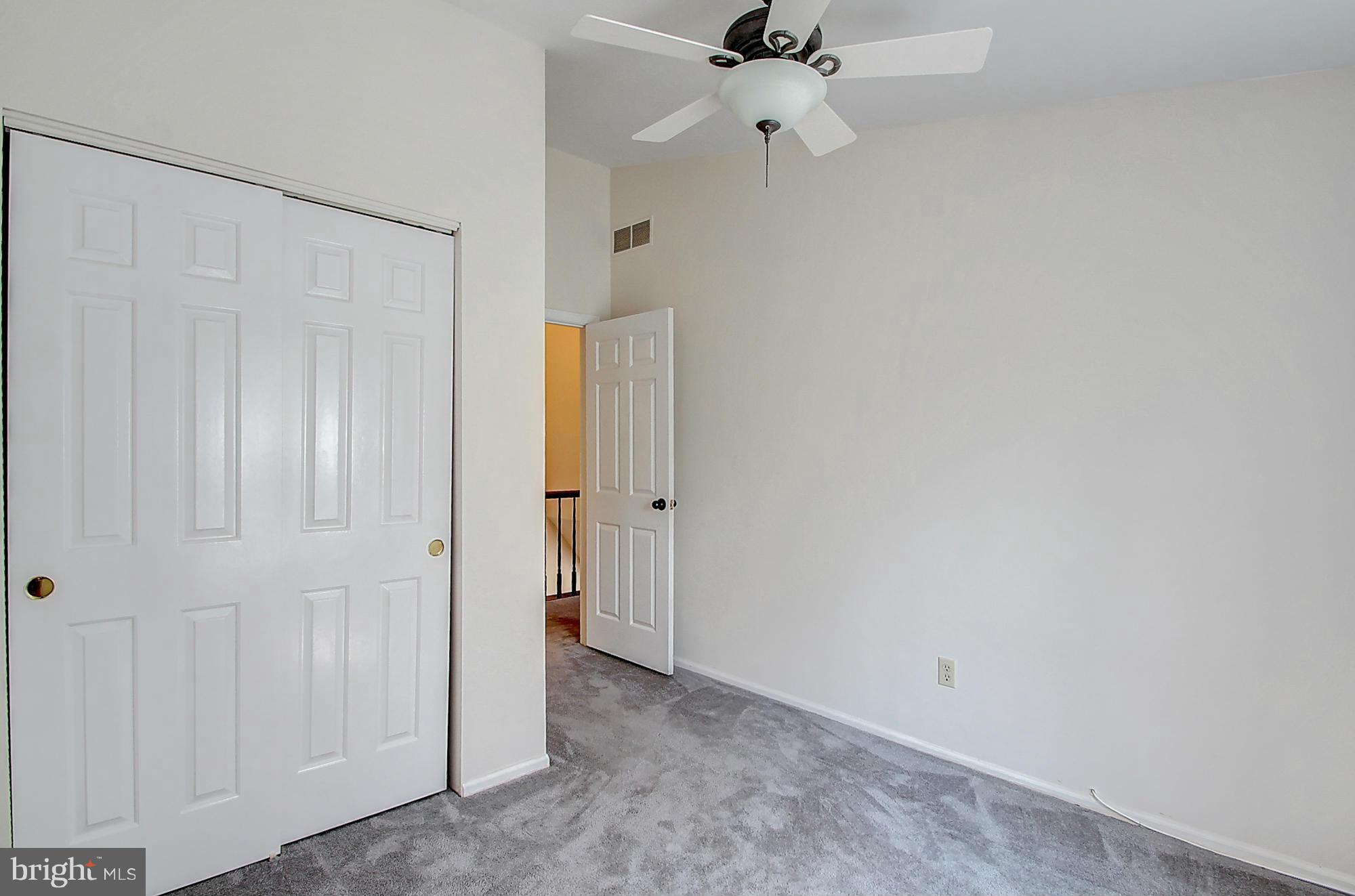 7222 Brookfalls Terrace Baltimore, MD 21209 - Photo 20 of 29 a view of a hallway with a shower