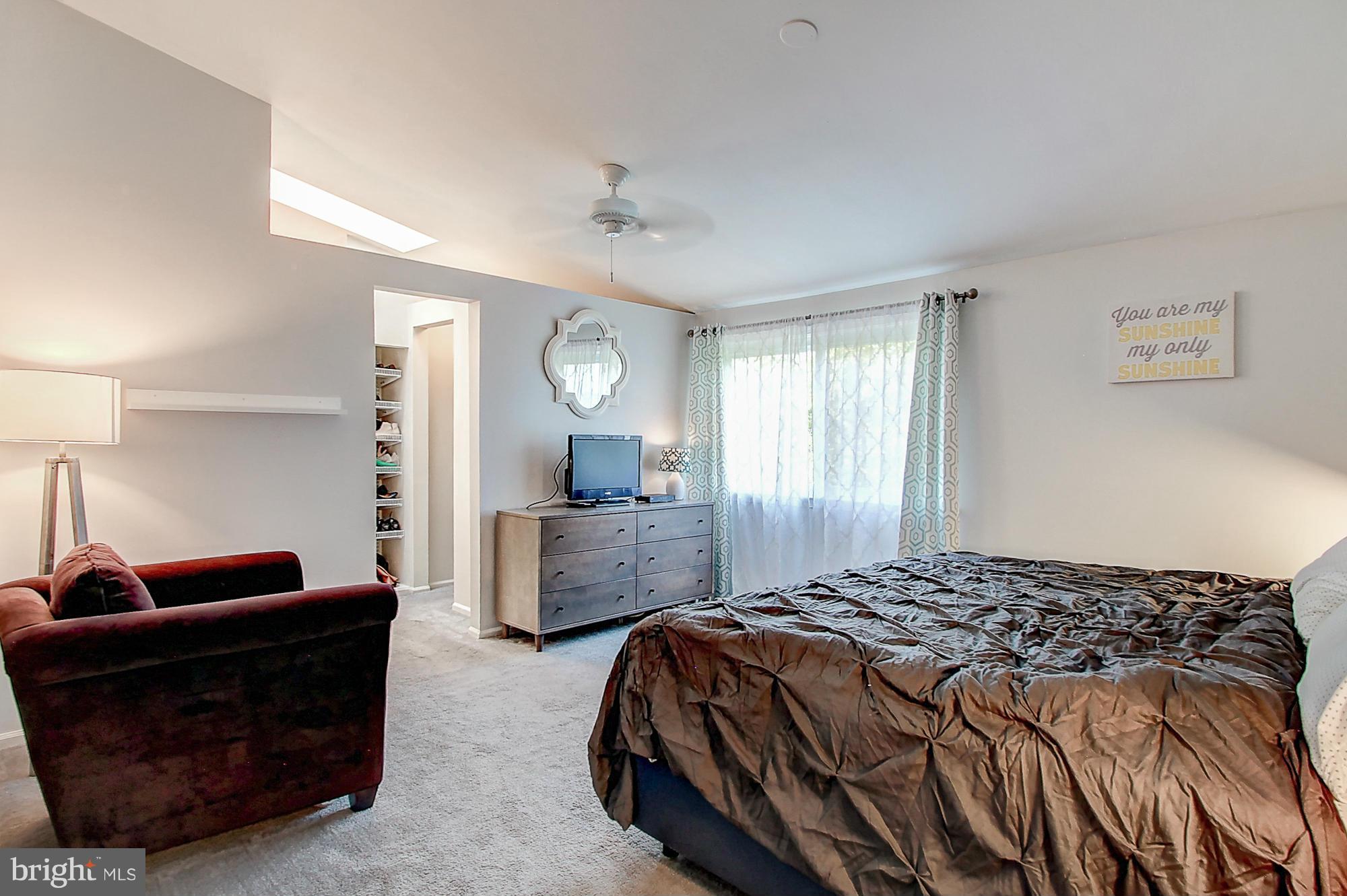 7222 Brookfalls Terrace Baltimore, MD 21209 - Photo 23 of 29 a bedroom with a bed and a dresser in it