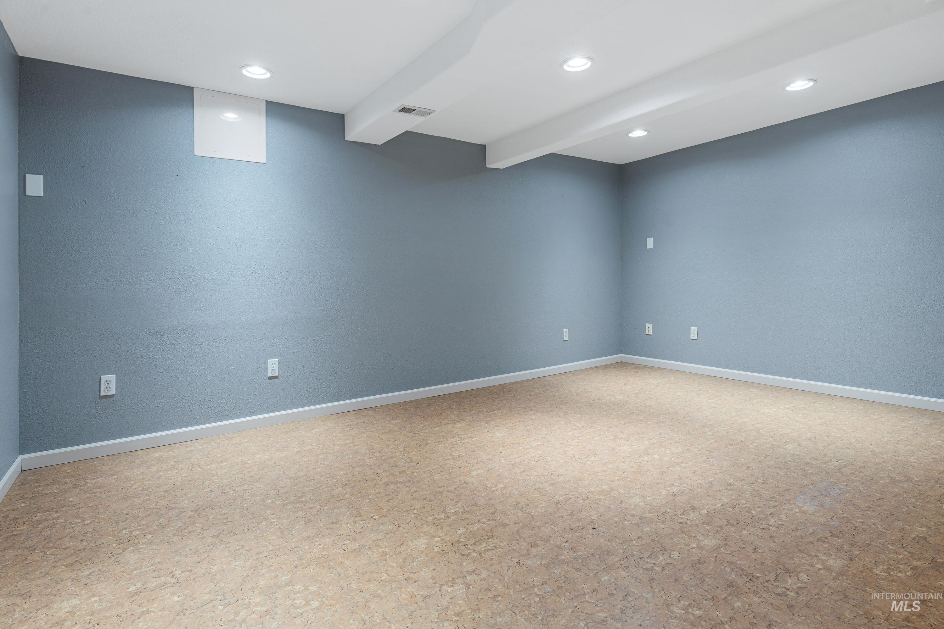 1266 Maple Street Clarkston, WA 99403 - Photo 25 of 44 Recessed lighting, light-toned flooring, and painted walls