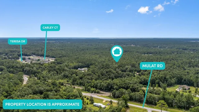 a view of a street with a houses