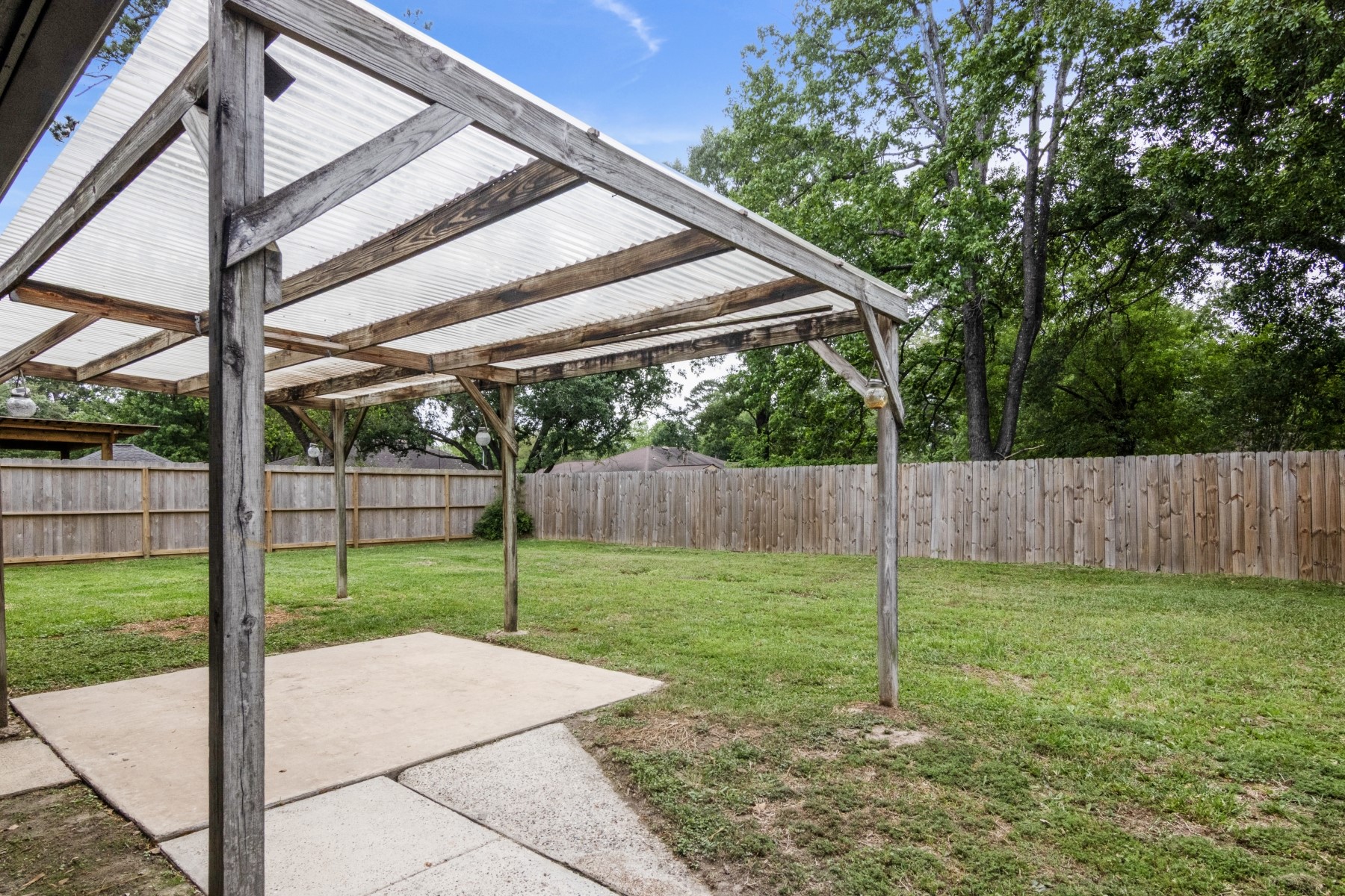 2531 North Spring Drive Spring, TX 77373 - Photo 22 of 24 a view of a backyard with a swing