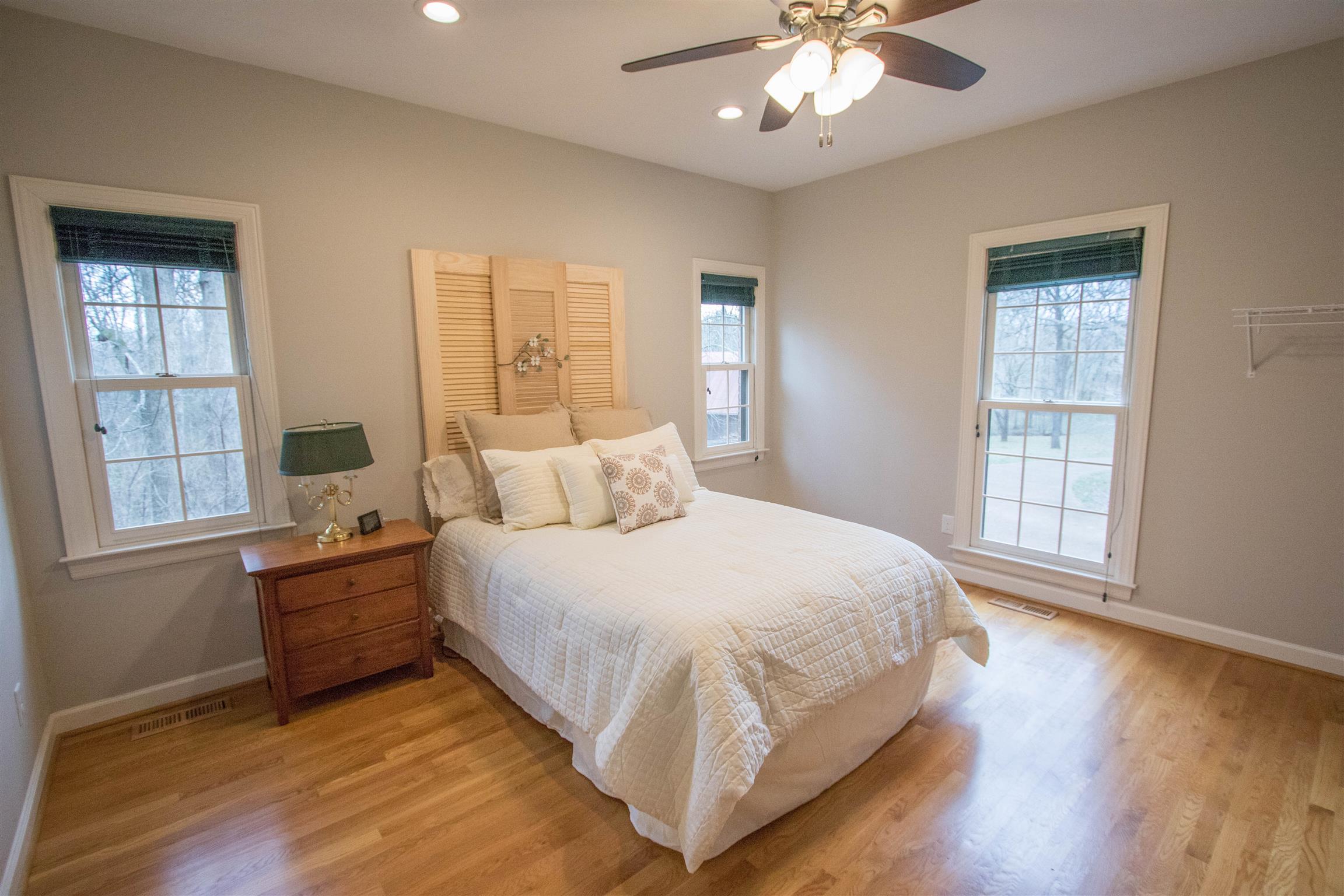 4304 Warren Road Franklin, TN 37067 - Photo 17 of 30 a bedroom with a large bed and a window