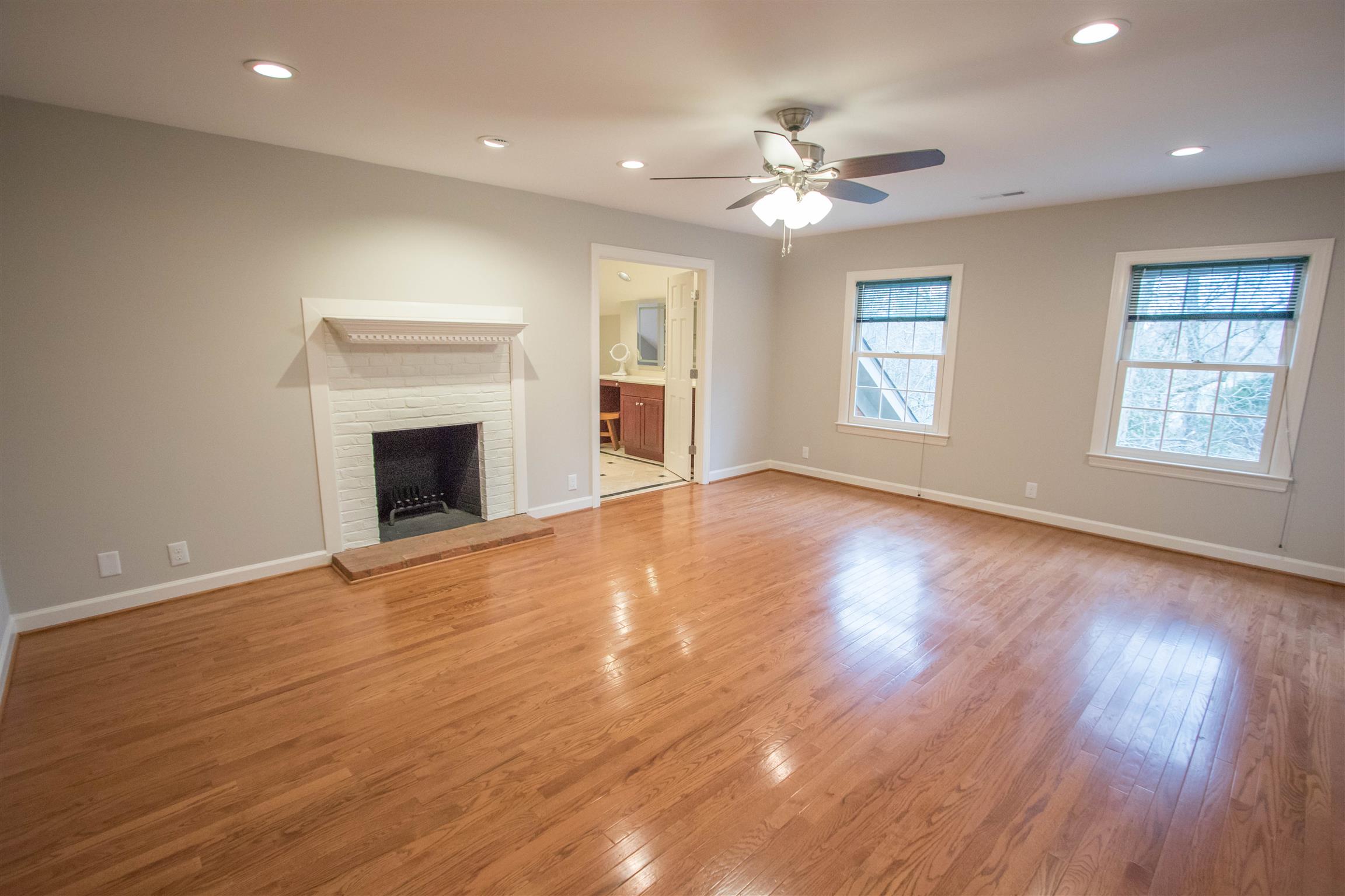 4304 Warren Road Franklin, TN 37067 - Photo 20 of 30 a view of an empty room with wooden floor and a window