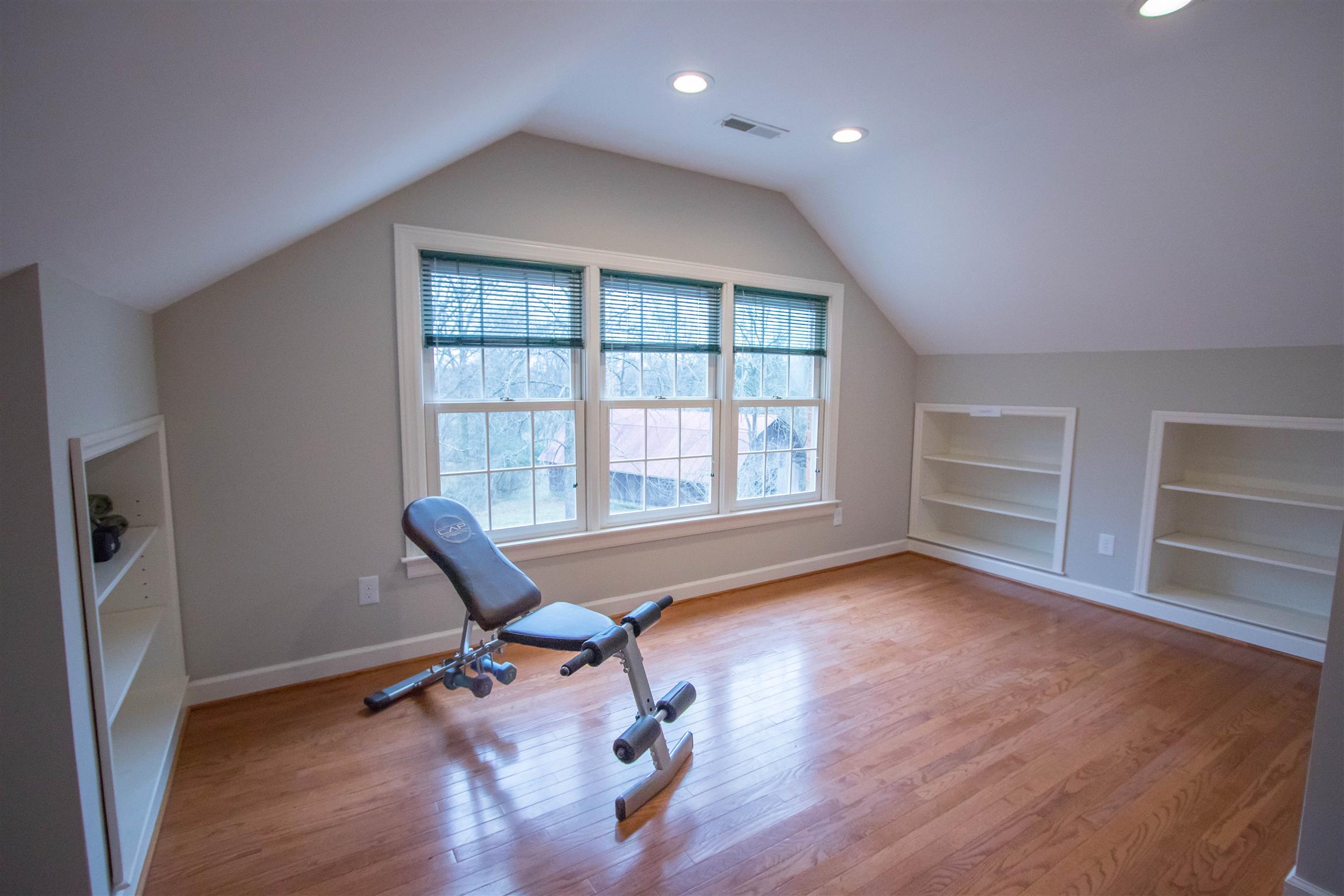 4304 Warren Road Franklin, TN 37067 - Photo 22 of 30 a view of a room with wooden floor and windows