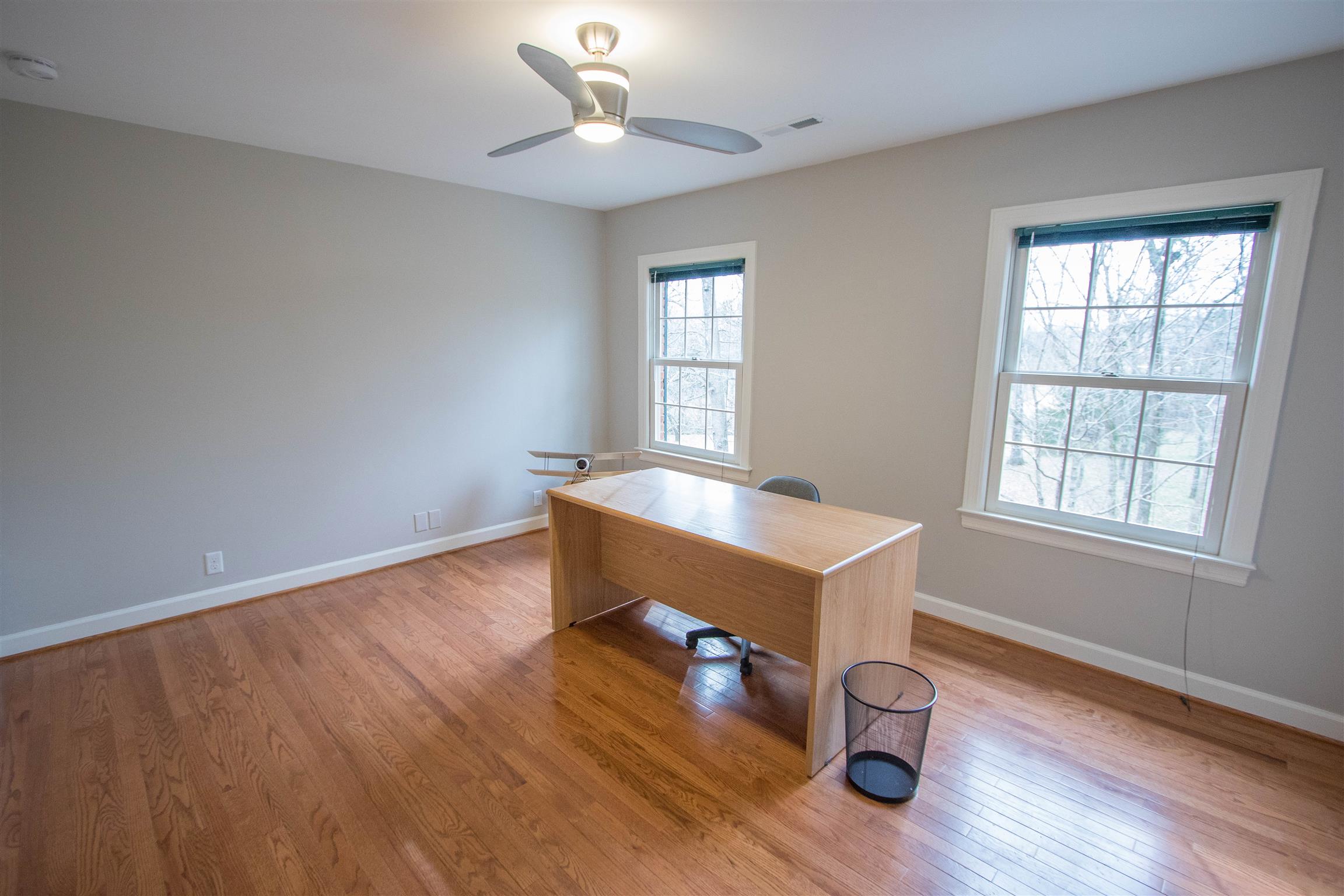 4304 Warren Road Franklin, TN 37067 - Photo 26 of 30 a view of workspace room with wooden floor and ceiling fan