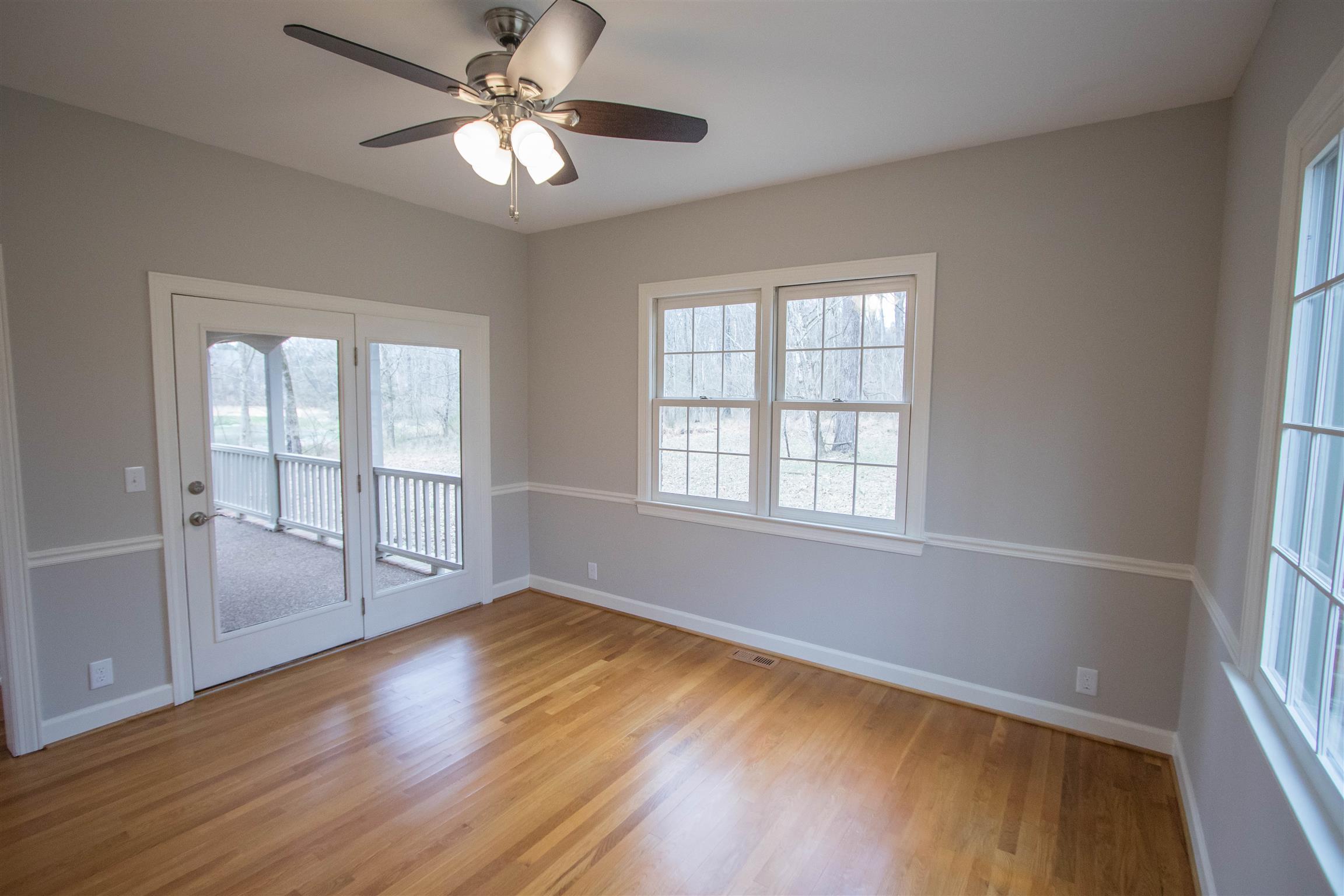 4304 Warren Road Franklin, TN 37067 - Photo 6 of 30 wooden floor in an empty room with a window