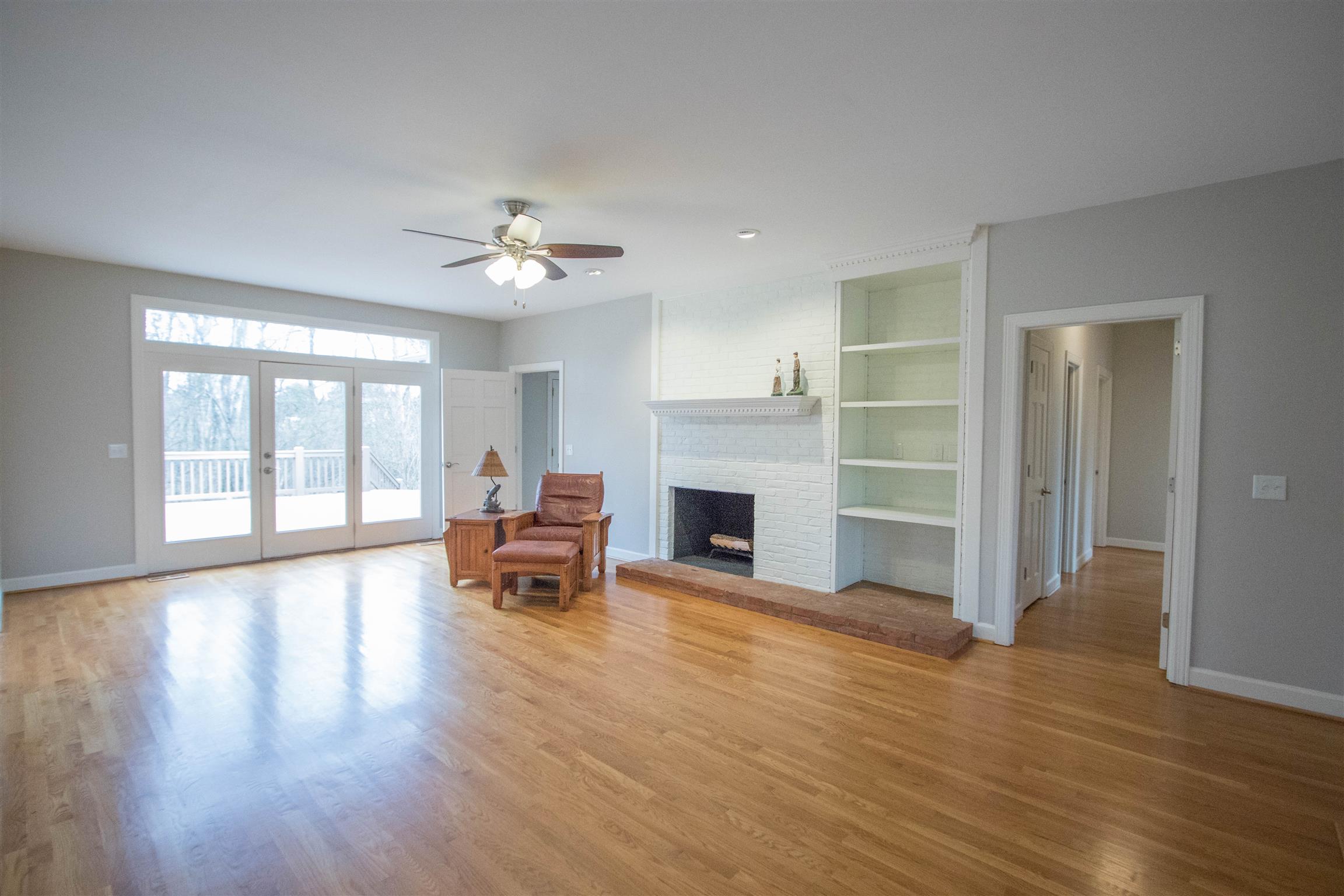 4304 Warren Road Franklin, TN 37067 - Photo 10 of 30 a living room with furniture and a fireplace