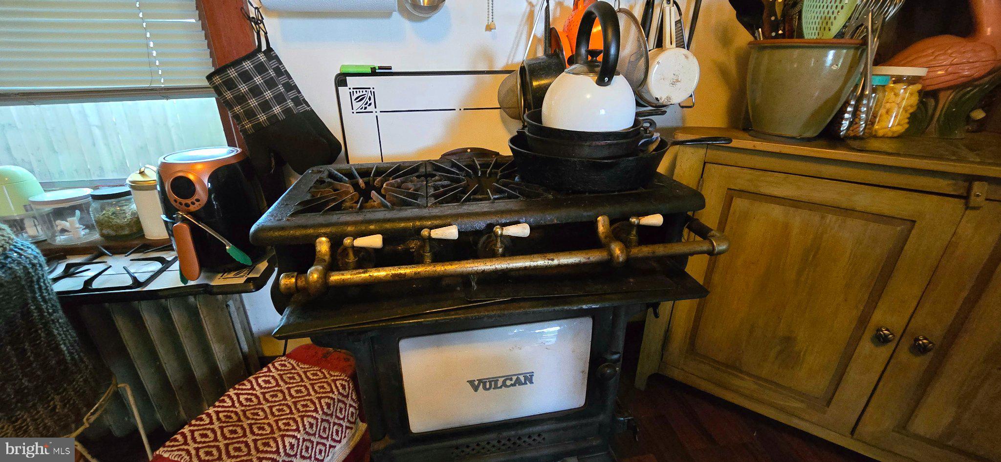 1123 Butler Street Reading, PA 19601 - Photo 7 of 15 Vintage stove with rustic charm.
