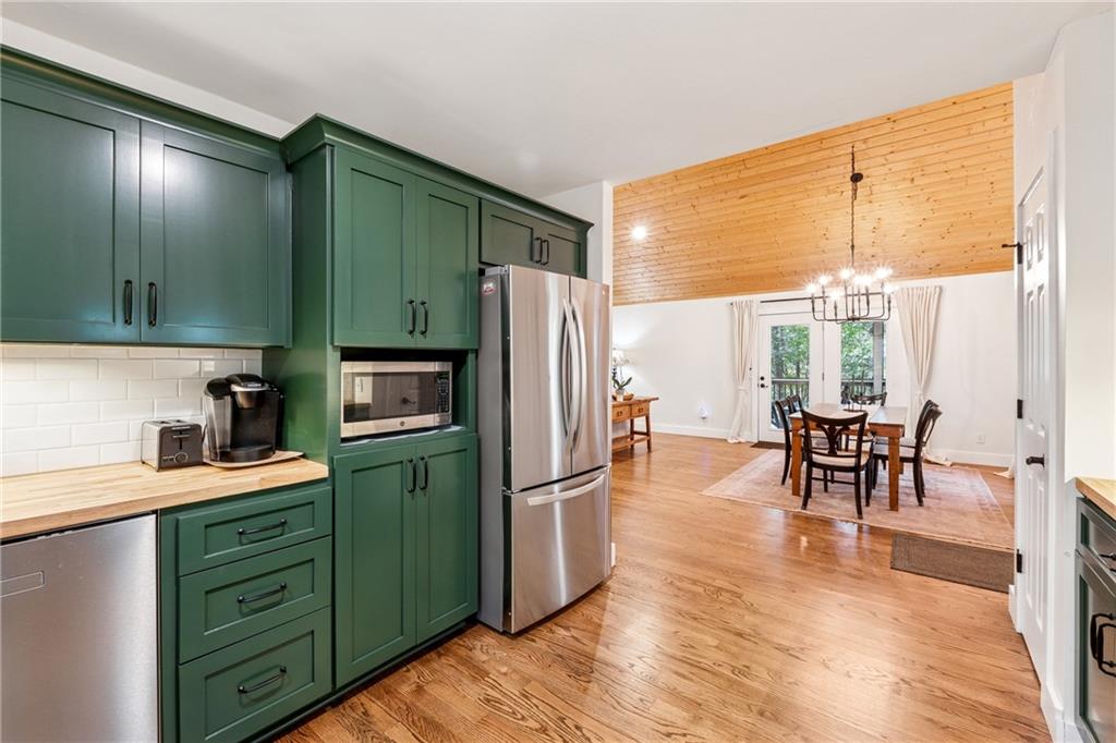 43 Morgan Walk Jasper, GA 30143 - Photo 13 of 55 a kitchen with stainless steel appliances granite countertop a refrigerator and a sink