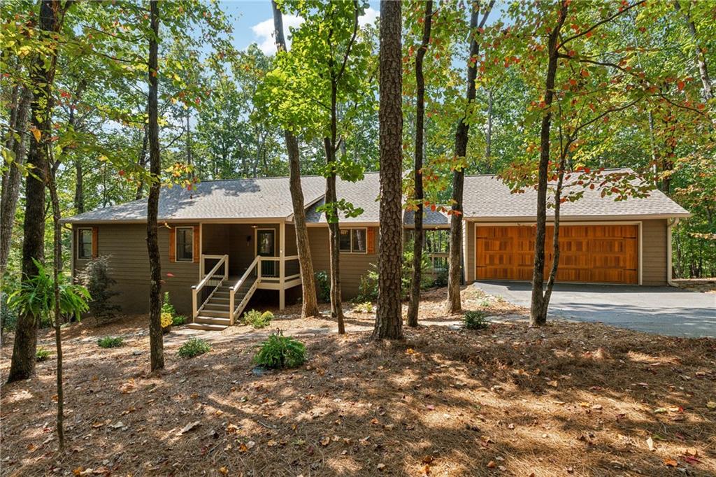 43 Morgan Walk Jasper, GA 30143 - Photo 2 of 55 a view of a house with backyard and a large tree