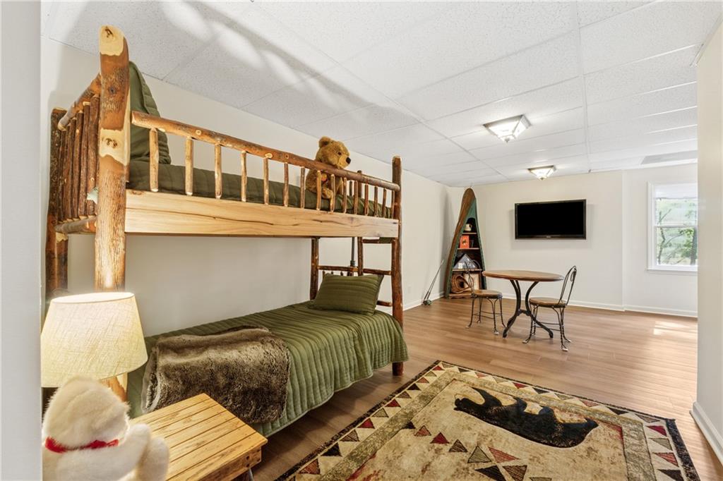 43 Morgan Walk Jasper, GA 30143 - Photo 30 of 55 a living room with furniture and a flat screen tv