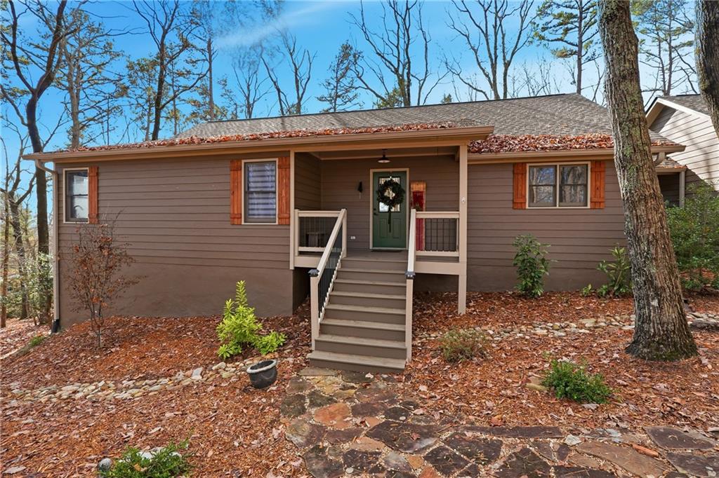 43 Morgan Walk Jasper, GA 30143 - Photo 3 of 55 a view of a house with a window and wooden fence