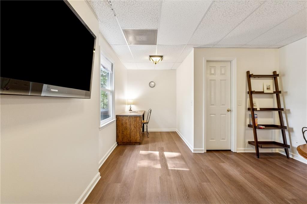 43 Morgan Walk Jasper, GA 30143 - Photo 31 of 55 a view of a hallway with wooden floor and cabinet