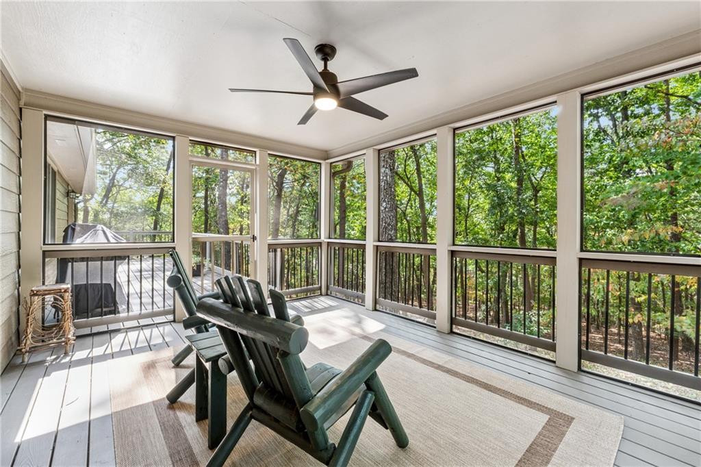 43 Morgan Walk Jasper, GA 30143 - Photo 34 of 55 a view of a dining room with furniture large windows and wooden floor