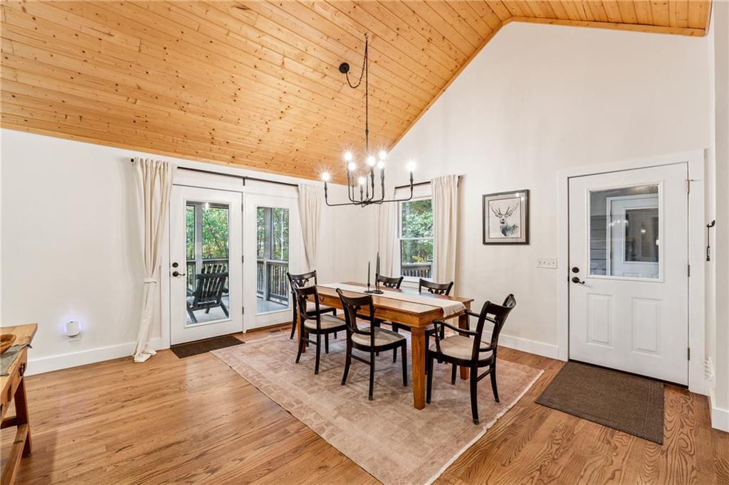 43 Morgan Walk Jasper, GA 30143 - Photo 7 of 55 a dining room with furniture a chandelier and wooden floor