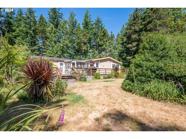 a view of swimming pool with a yard