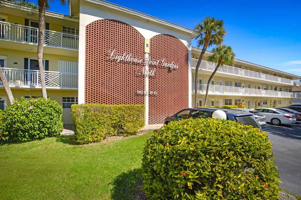 1951 Northeast 39th Street, Unit 343 Lighthouse Point, FL 33064 - Photo 2 of 28 a view of an entrance to house
