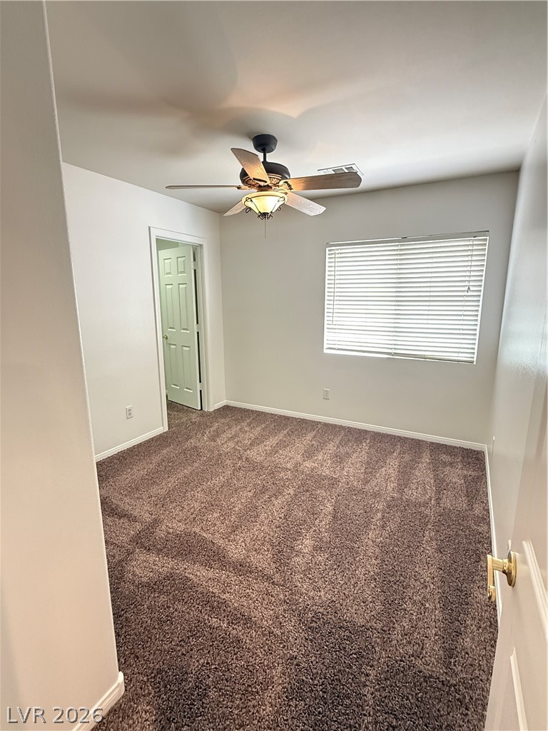 10975 Calcedonian Street Las Vegas, NV 89141 - Photo 16 of 25 This interior space features vaulted ceilings and soft carpet flooring.