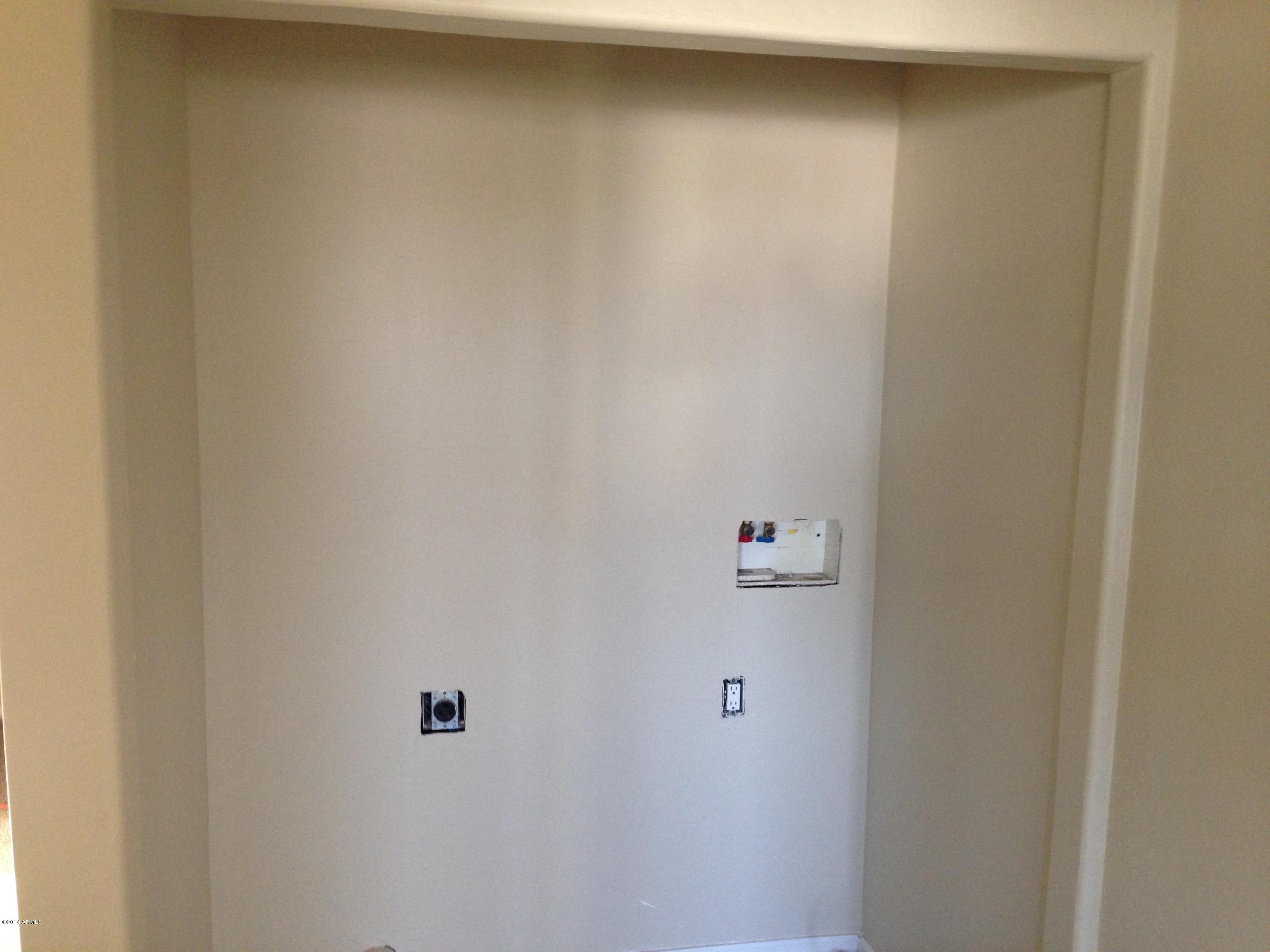 2719 East Broadway Road Phoenix, AZ 85040 - Photo 11 of 15 Inside laundry area in upstairs hallway.