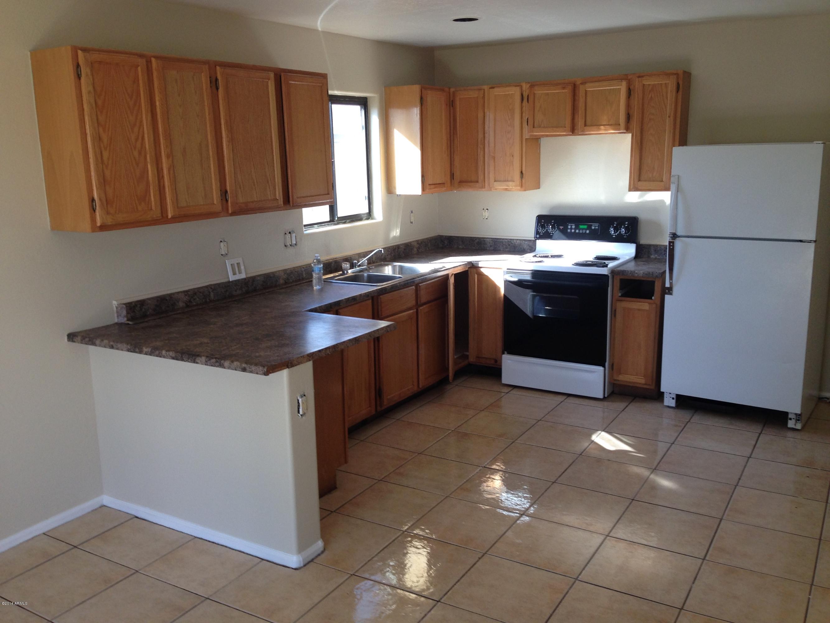 2719 East Broadway Road Phoenix, AZ 85040 - Photo 3 of 15 Large open kitchen.