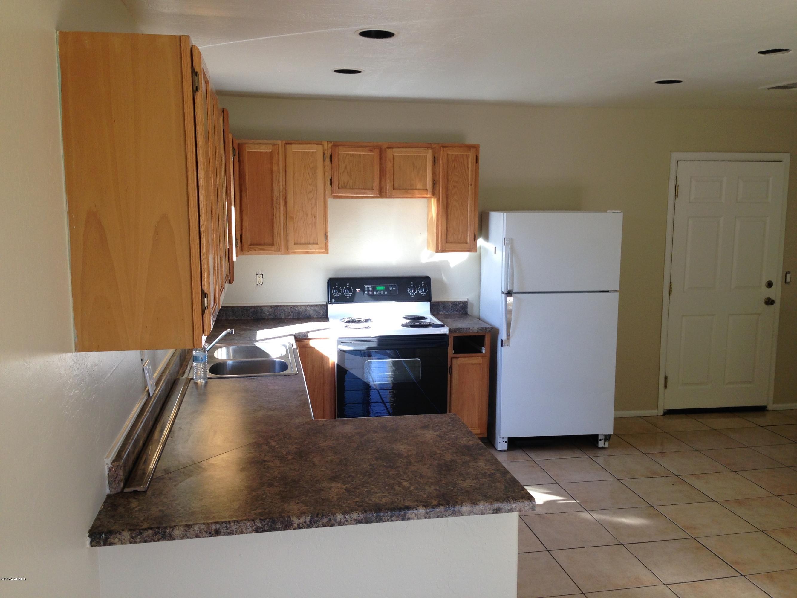 2719 East Broadway Road Phoenix, AZ 85040 - Photo 4 of 15 Another view of kitchen.