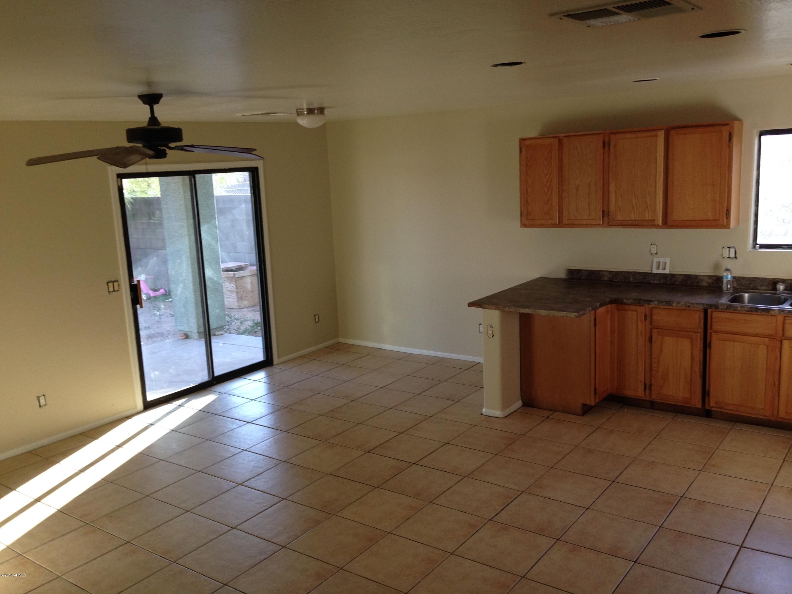 2719 East Broadway Road Phoenix, AZ 85040 - Photo 5 of 15 Great room of kitchen.