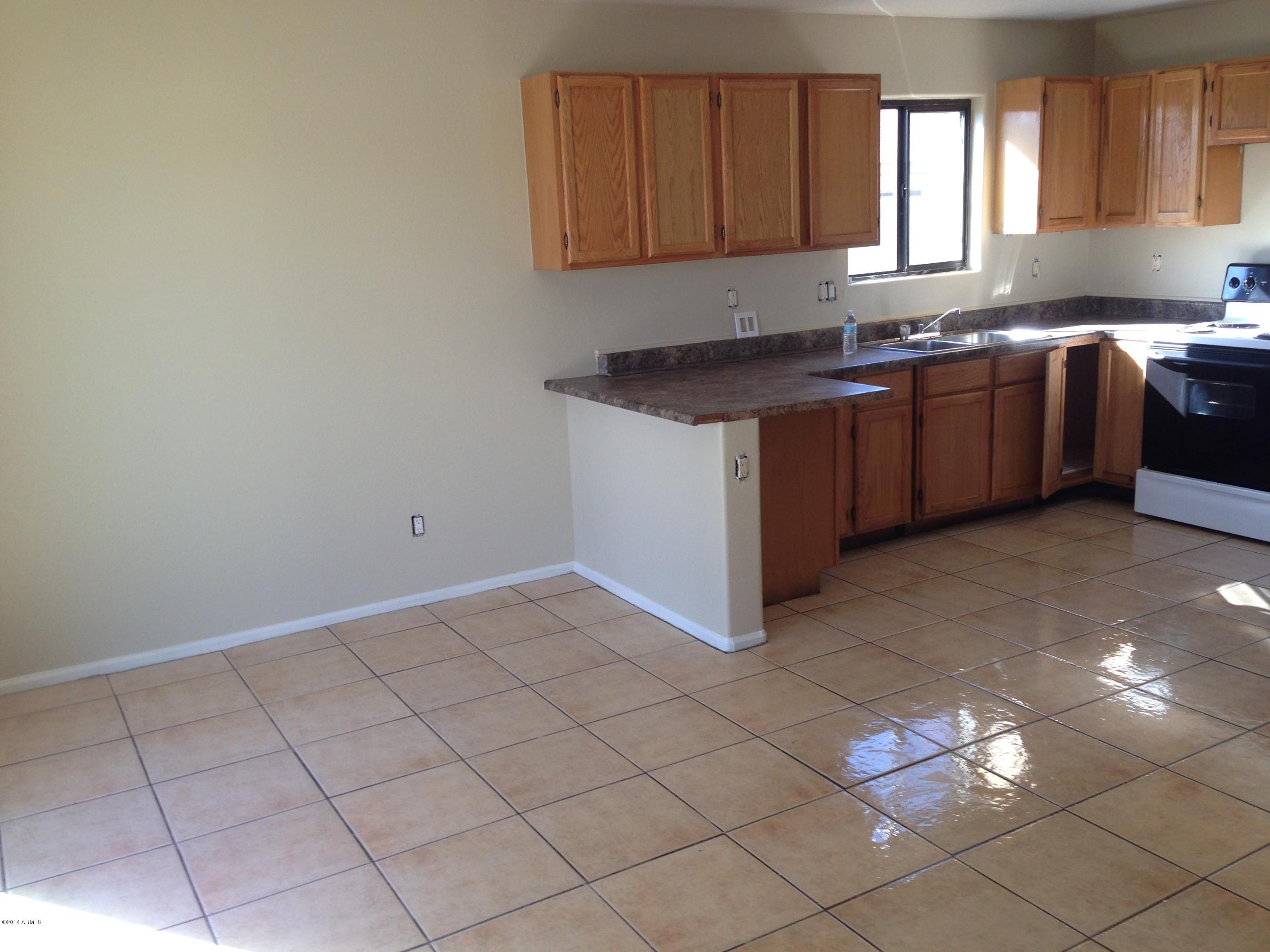 2719 East Broadway Road Phoenix, AZ 85040 - Photo 6 of 15 Dining area off kitchen