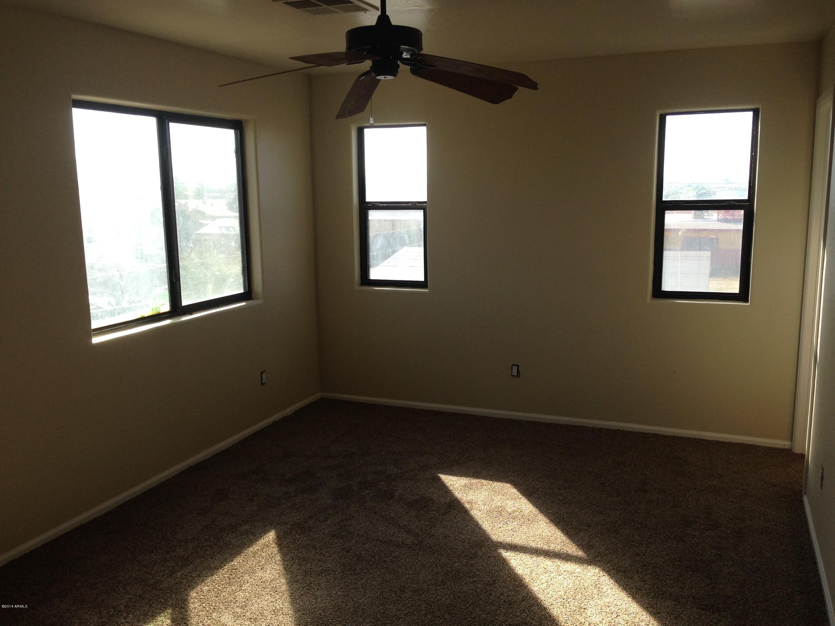 2719 East Broadway Road Phoenix, AZ 85040 - Photo 7 of 15 Large master bedroom.