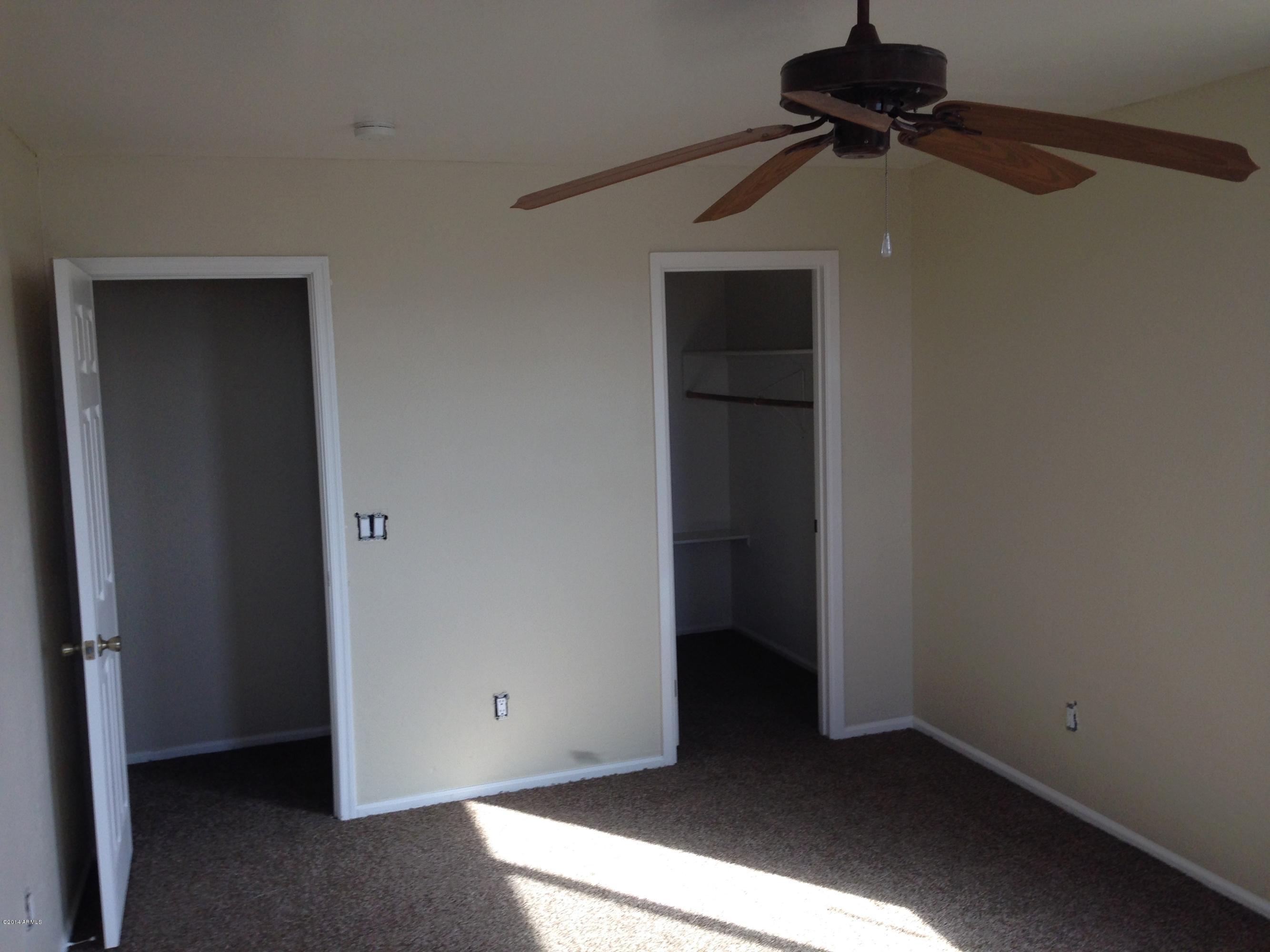 2719 East Broadway Road Phoenix, AZ 85040 - Photo 8 of 15 Bedroom/with walk in closet.