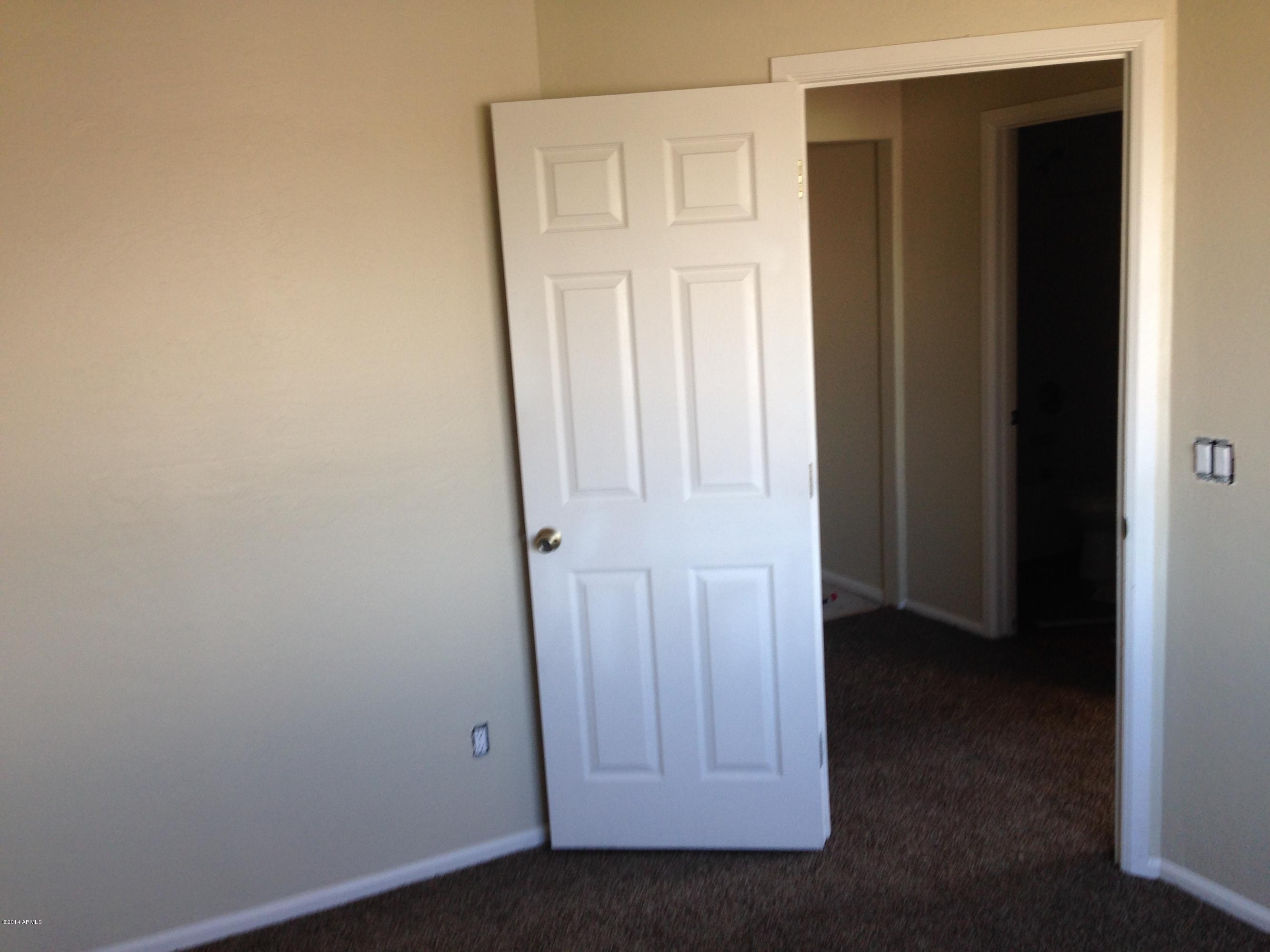 2719 East Broadway Road Phoenix, AZ 85040 - Photo 9 of 15 New carpet in all bedrooms and hall.