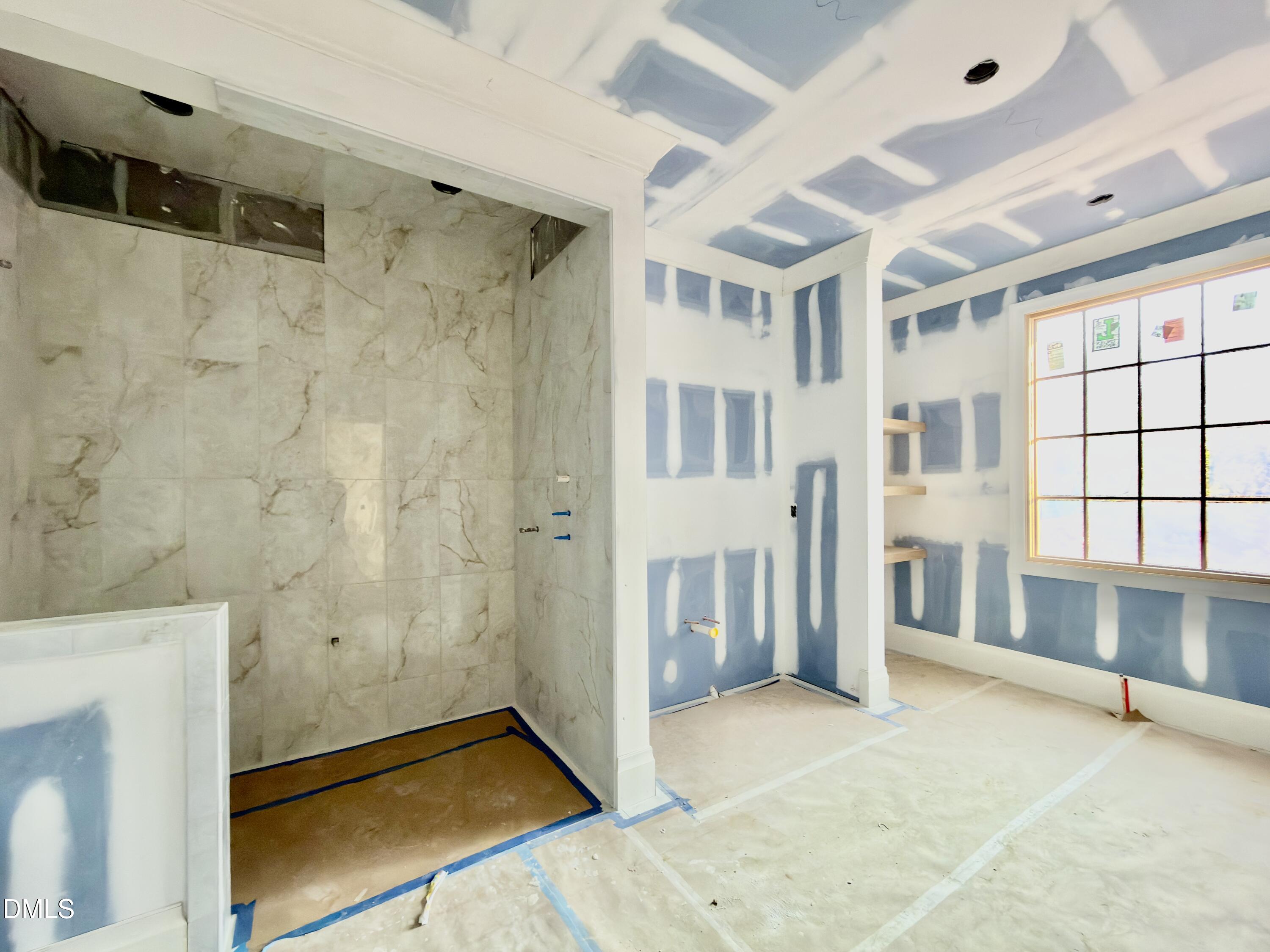 1412 Pony Run Road Raleigh, NC 27615 - Photo 17 of 42 a view of an empty room with a window