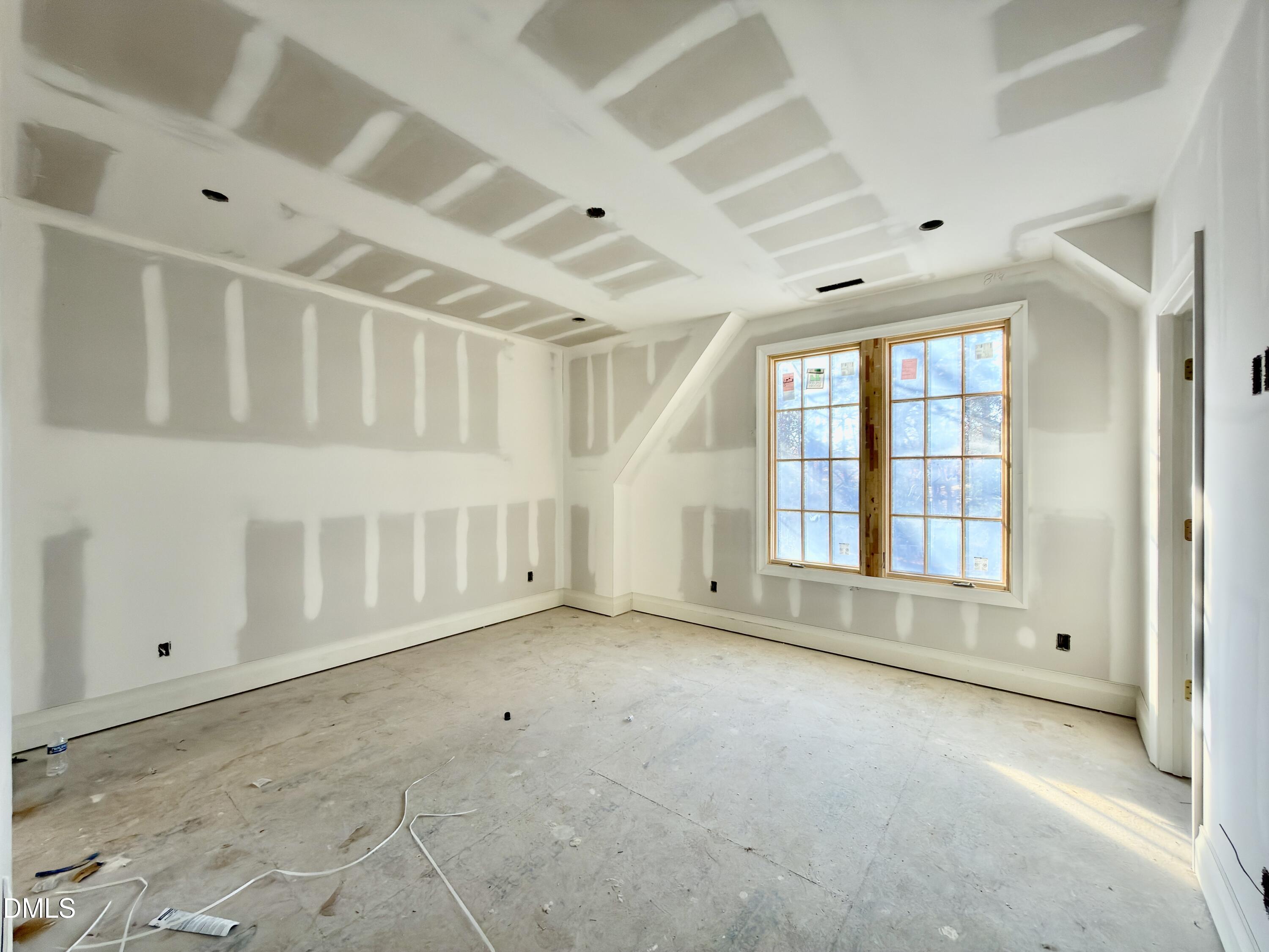 1412 Pony Run Road Raleigh, NC 27615 - Photo 31 of 42 an empty room with windows